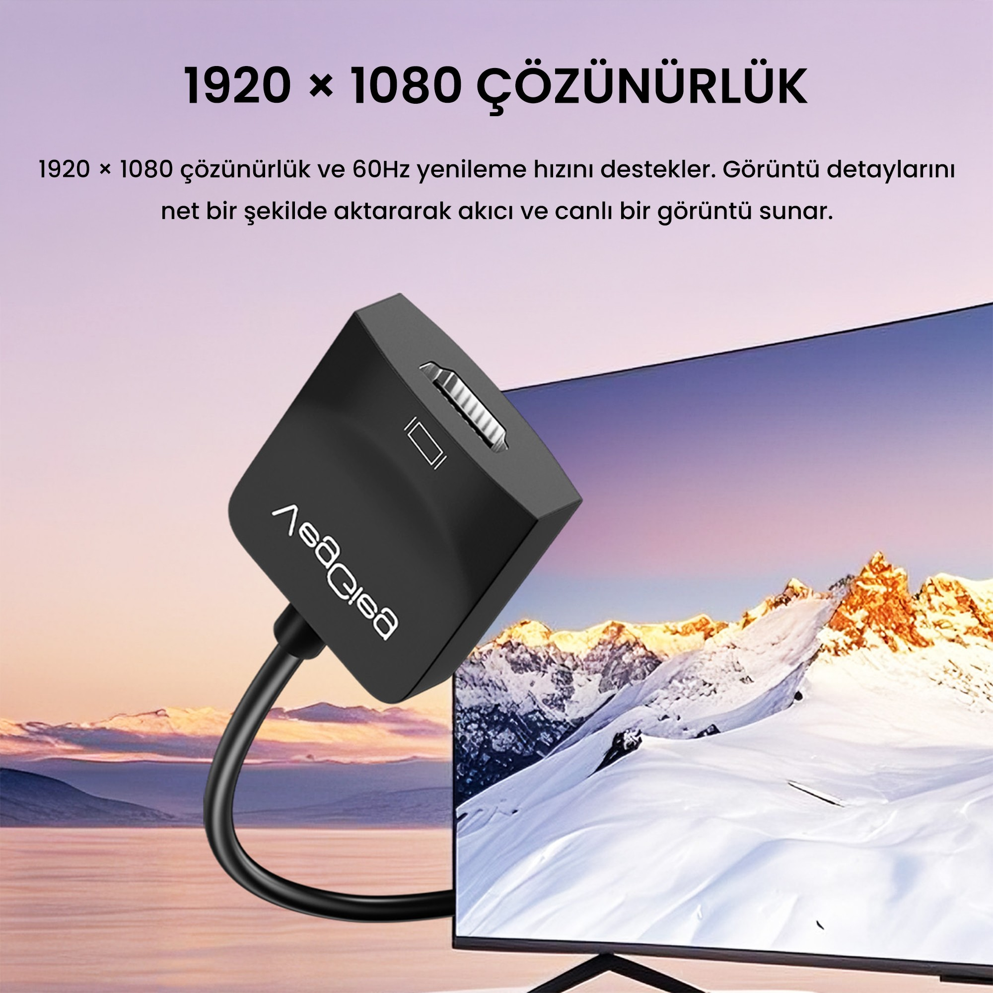 Karlı dağ manzaralı bir TV önünde siyah HDMI adaptörü ve metin.