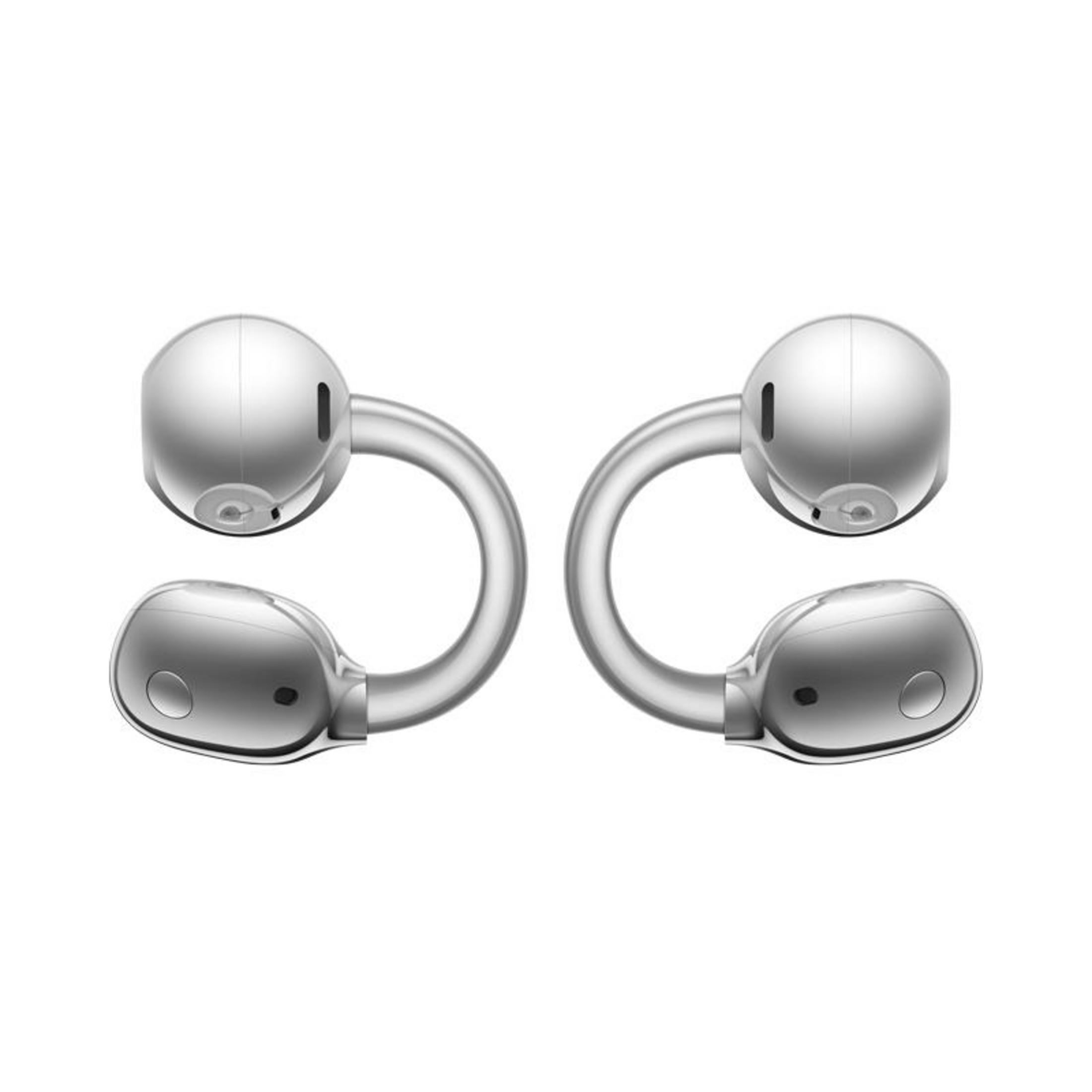 Due auricolari wireless argentati a forma di C su sfondo bianco.