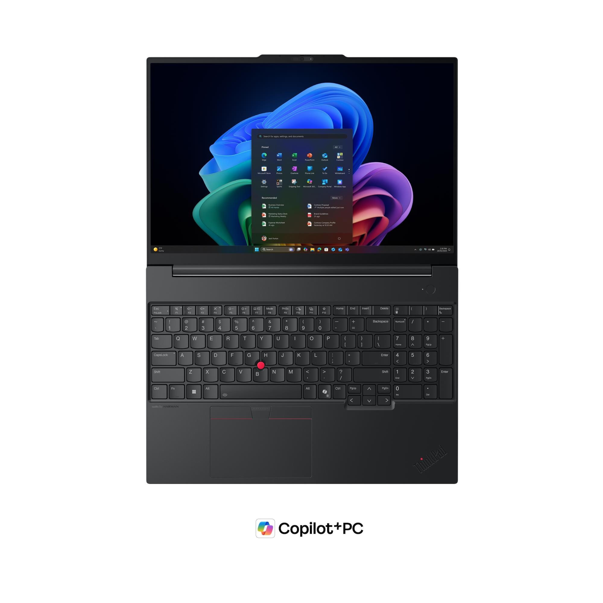 Un laptop nero con il menu Start di Windows 11 sullo schermo e una tastiera con un trackpoint rosso.