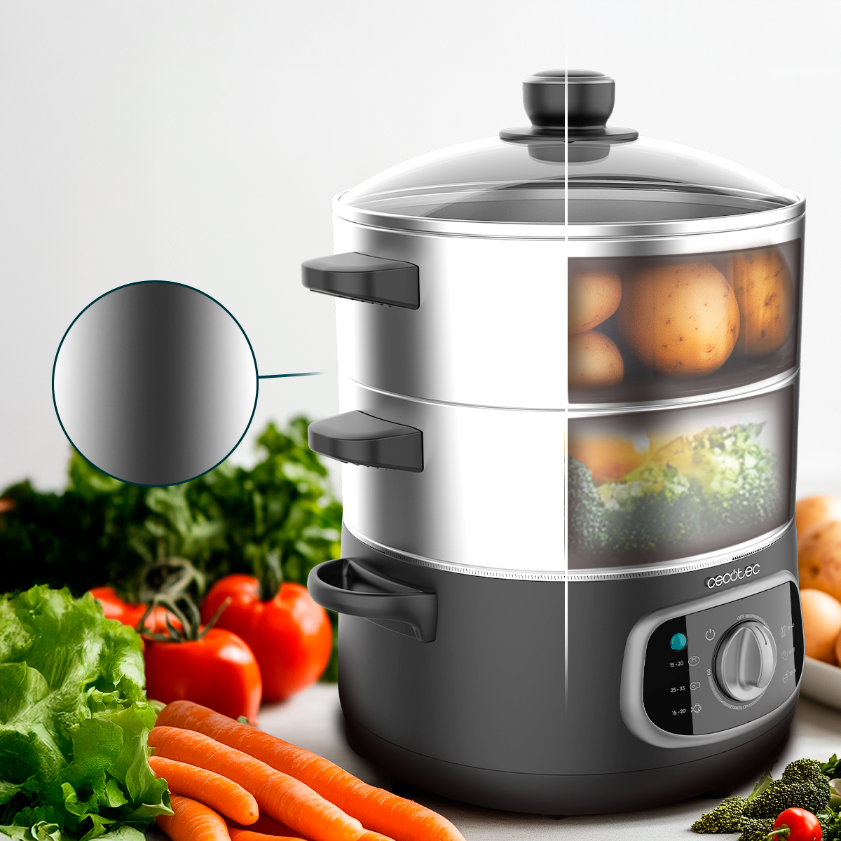 Una vaporiera elettrica in acciaio inossidabile a due livelli mostra patate e verdure, circondata da prodotti.