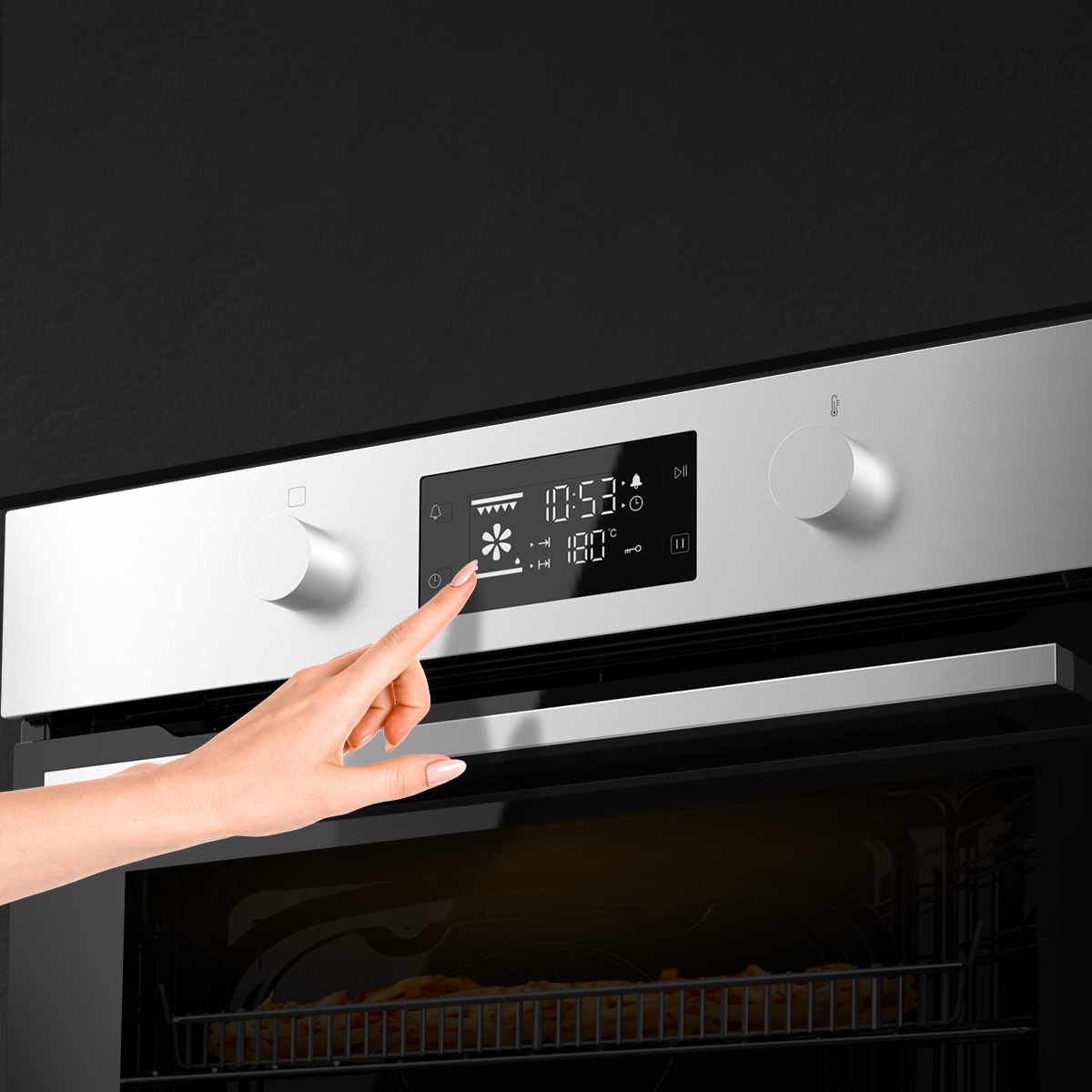 Una mano opera la pantalla táctil digital de un horno de acero inoxidable configurado a 180 grados Celsius.
