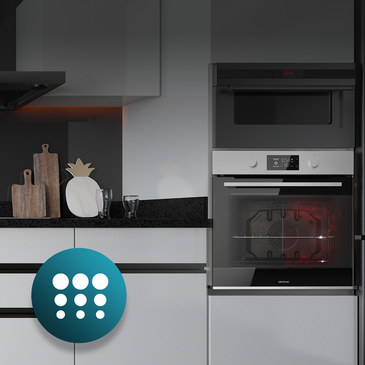 Cocina moderna con horno empotrado, microondas y tablas de cortar de madera.