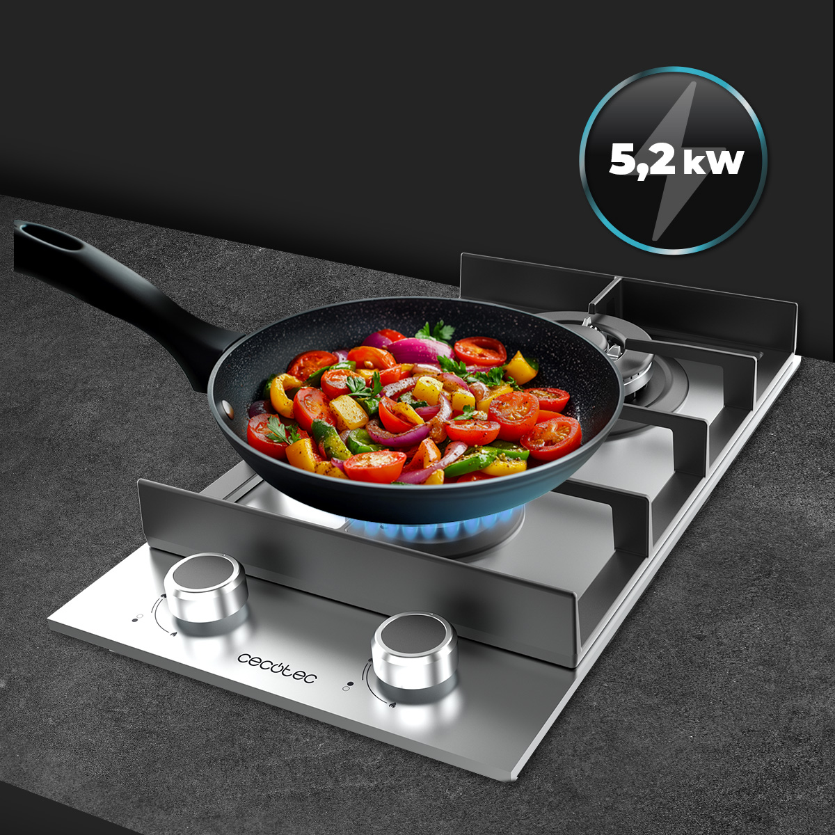 Una sartén con verduras en una estufa de gas, junto a un indicador de 5,2 kW.