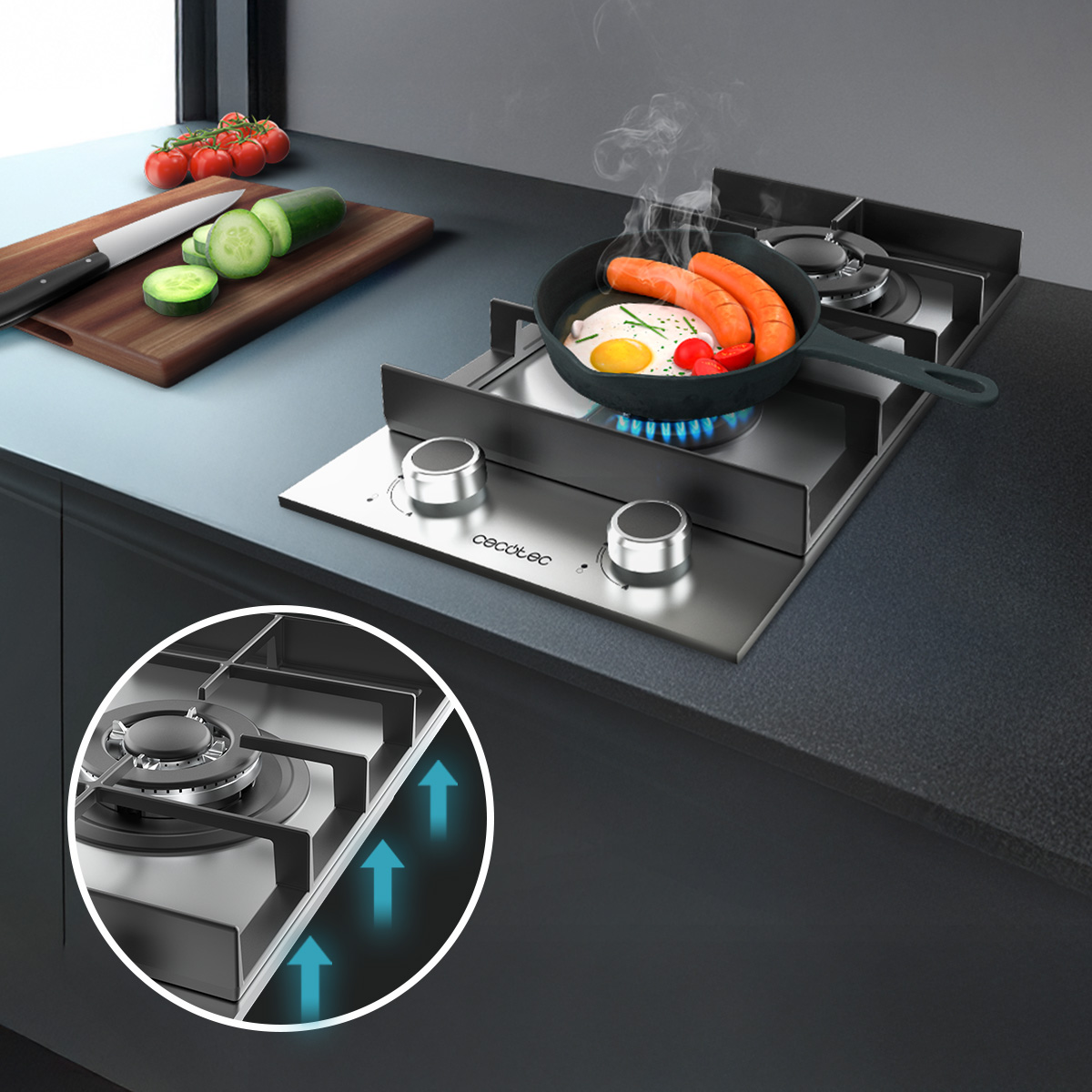 Placa de gas de acero inoxidable con sarten y huevo frito, y tabla de cortar con pepinos y tomates.