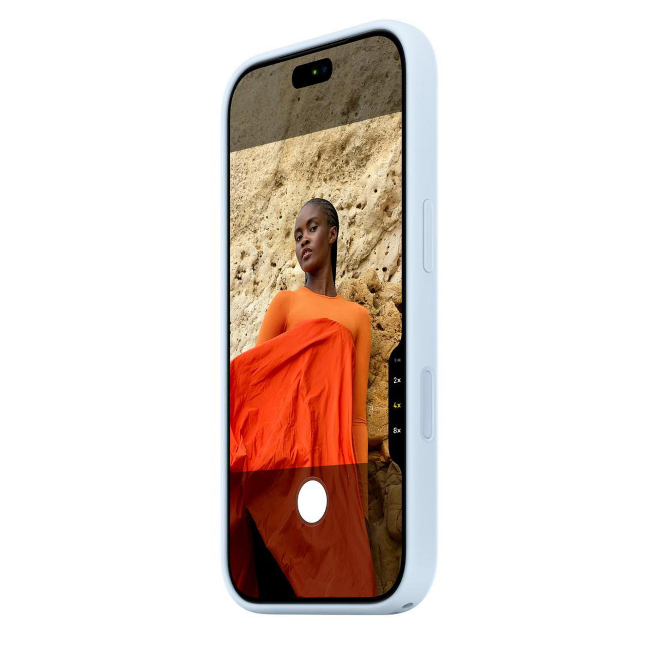 Un smartphone bleu clair affiche sur son écran la photo d'une femme devant un mur de grès.