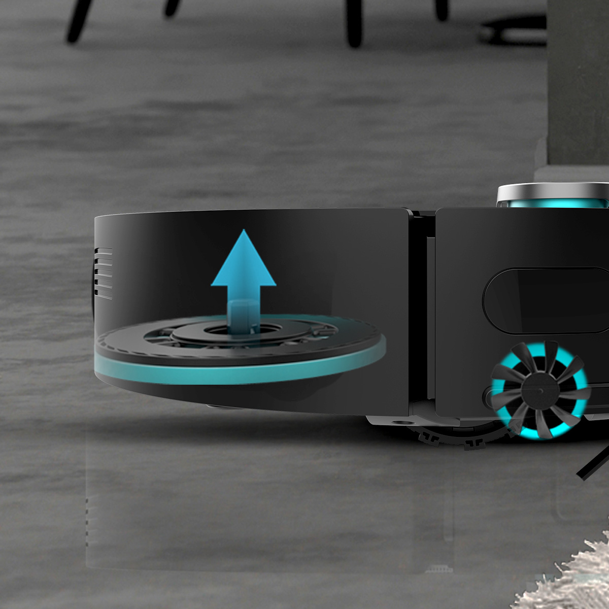 Un robot aspirapolvere nero con elementi grafici blu su pavimento grigio.