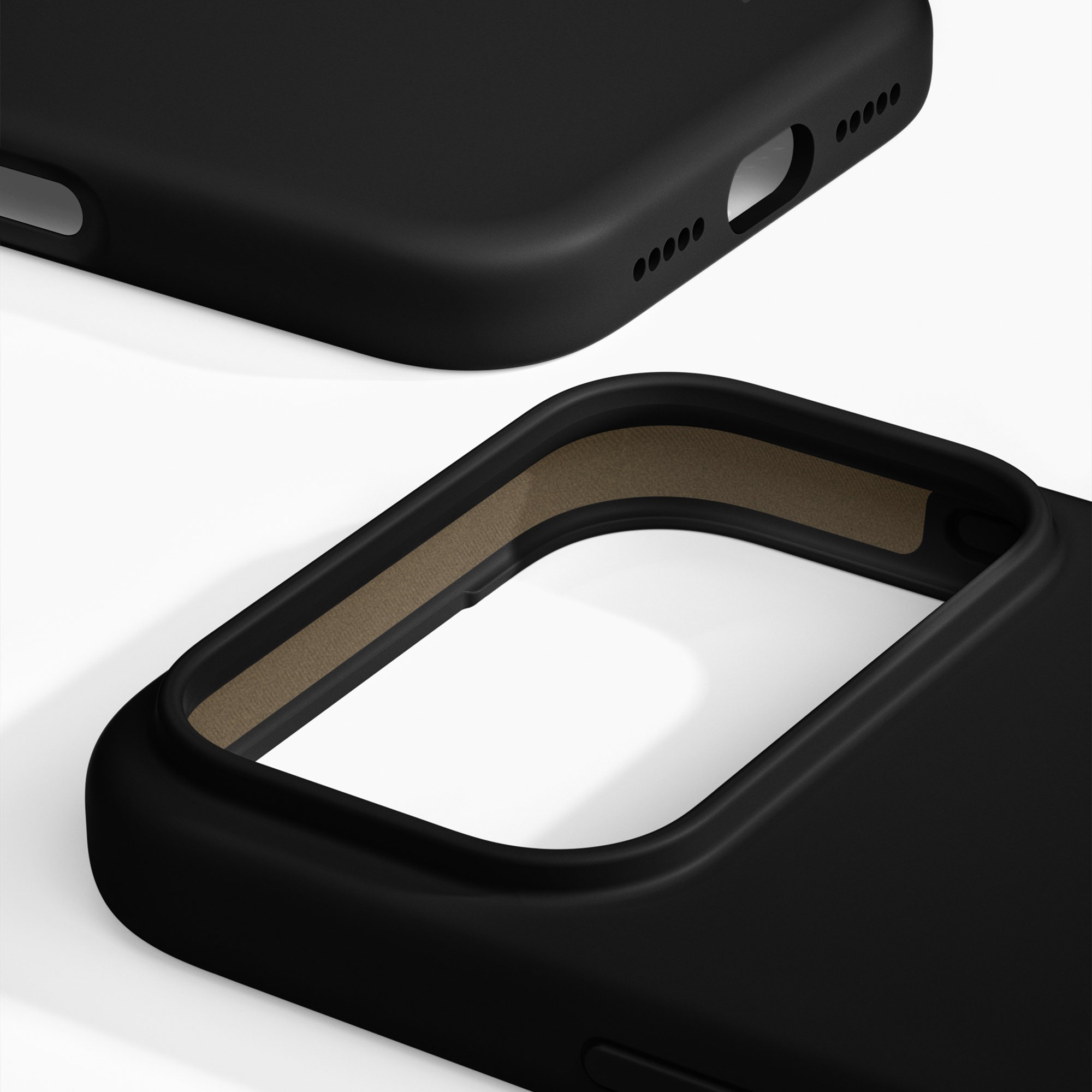 Deux coques de smartphone noires sur fond blanc, montrant la coque en silicone et la doublure intérieure.