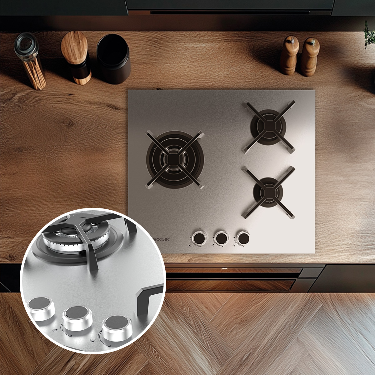 Placa de gas de acero inoxidable con cuatro quemadores y mandos en encimera de madera.