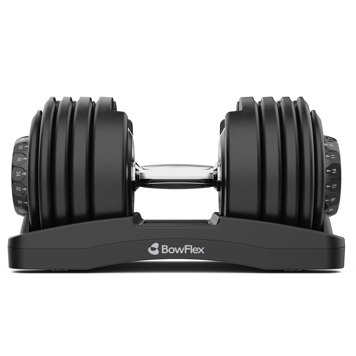 Eine schwarze, verstellbare Bowflex-Hantel liegt auf ihrer Ablage vor dunklem Hintergrund.