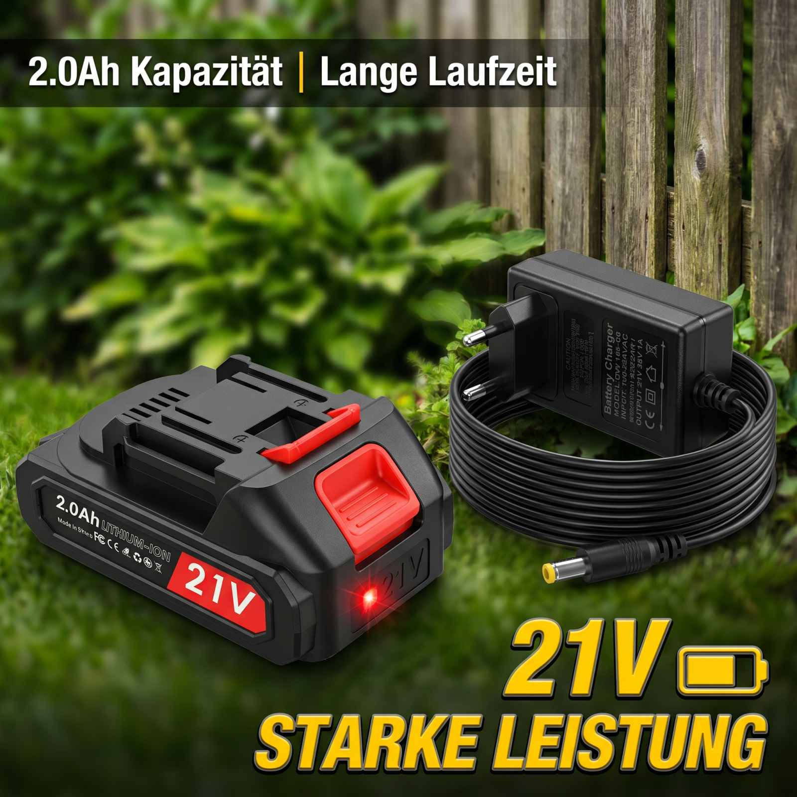 Ein 21V Lithium-Ionen-Akku und ein Ladegerät vor einer grünen Garten- und Holzzaunkulisse.