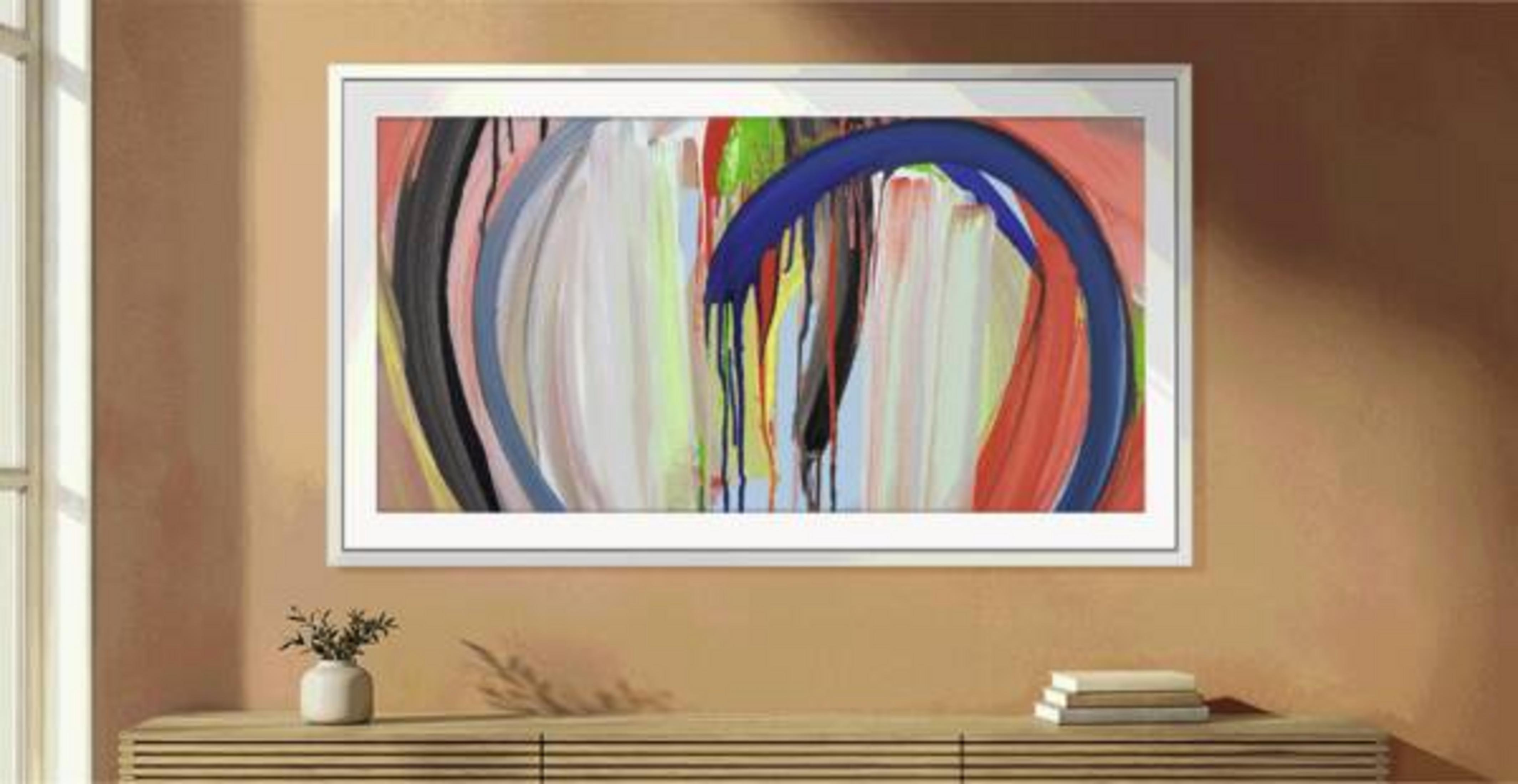 Une peinture abstraite encadrée avec des arcs bleus et des touches de couleur est accrochée au mur.