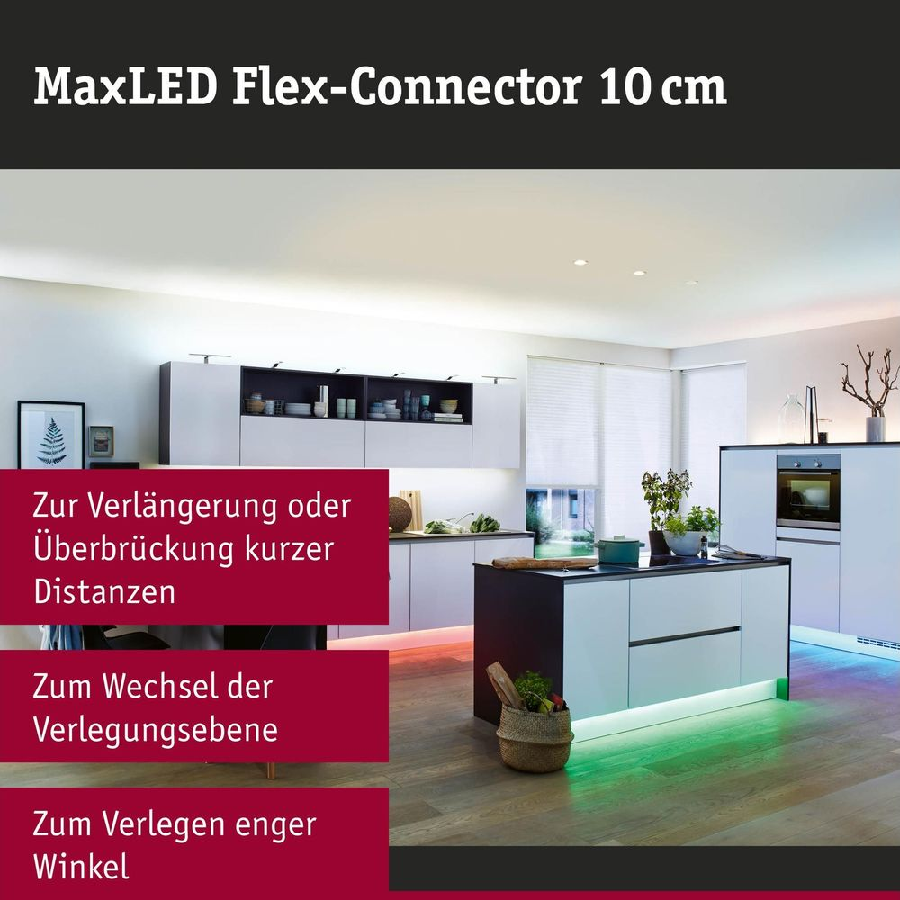 Moderne Küche mit weißer Küchenzeile und beleuchteten Unterschränken sowie rotem Textbanner.