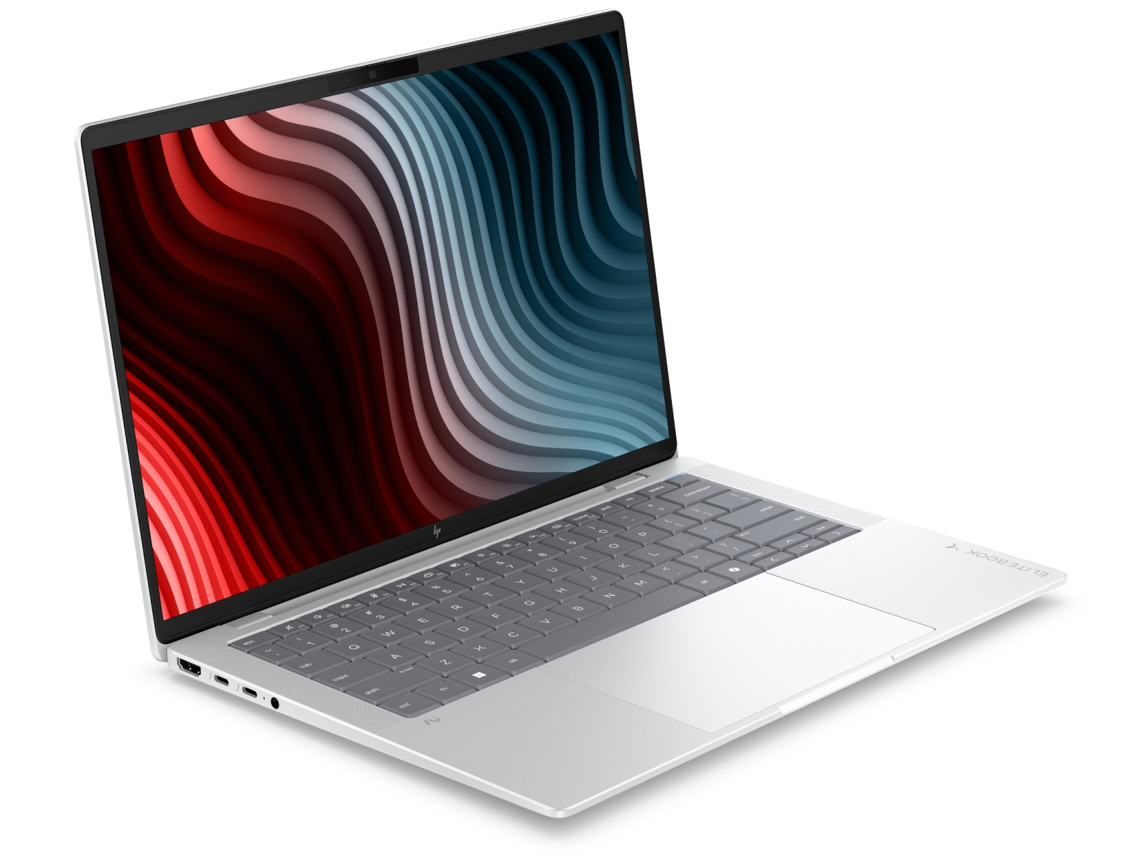 Un computer portatile argentato con tasti grigi, aperto e con uno schermo che mostra un motivo astratto a onde rosse e blu.