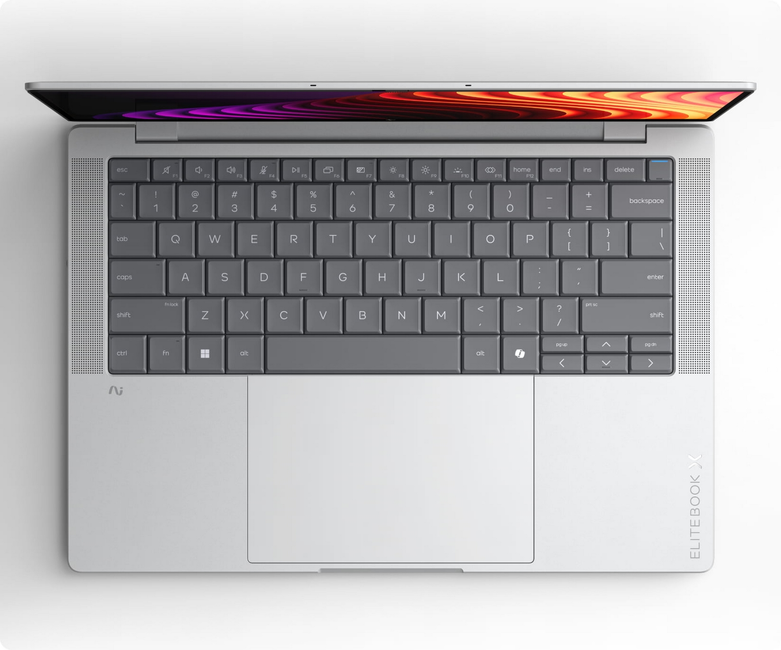 Vista dall'alto di un laptop argento con tastiera QWERTY grigia, ampio trackpad e logo EliteBook.