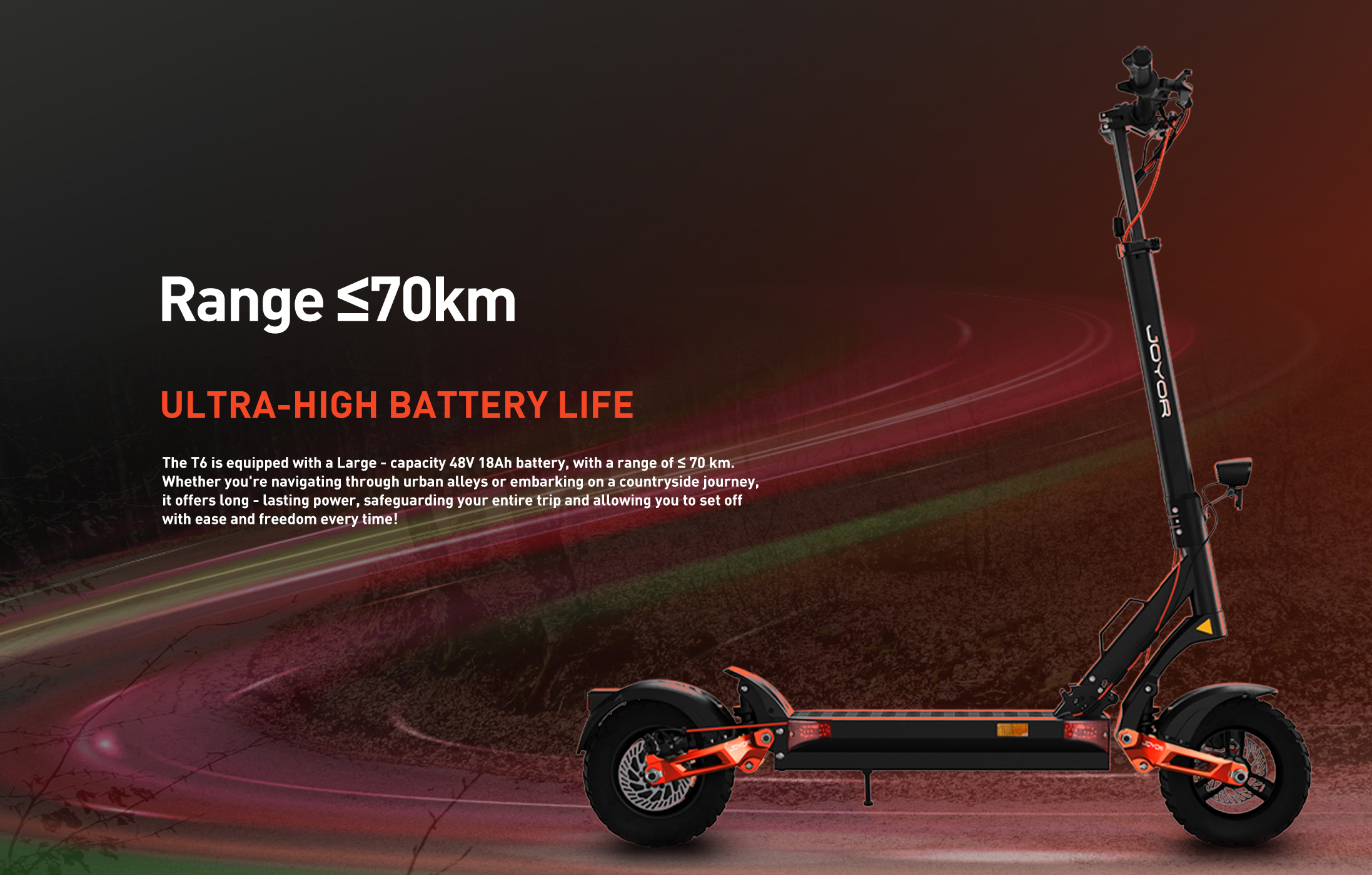 Monopattino elettrico nero Joyor T6 con dettagli arancioni su sfondo stradale rosso.