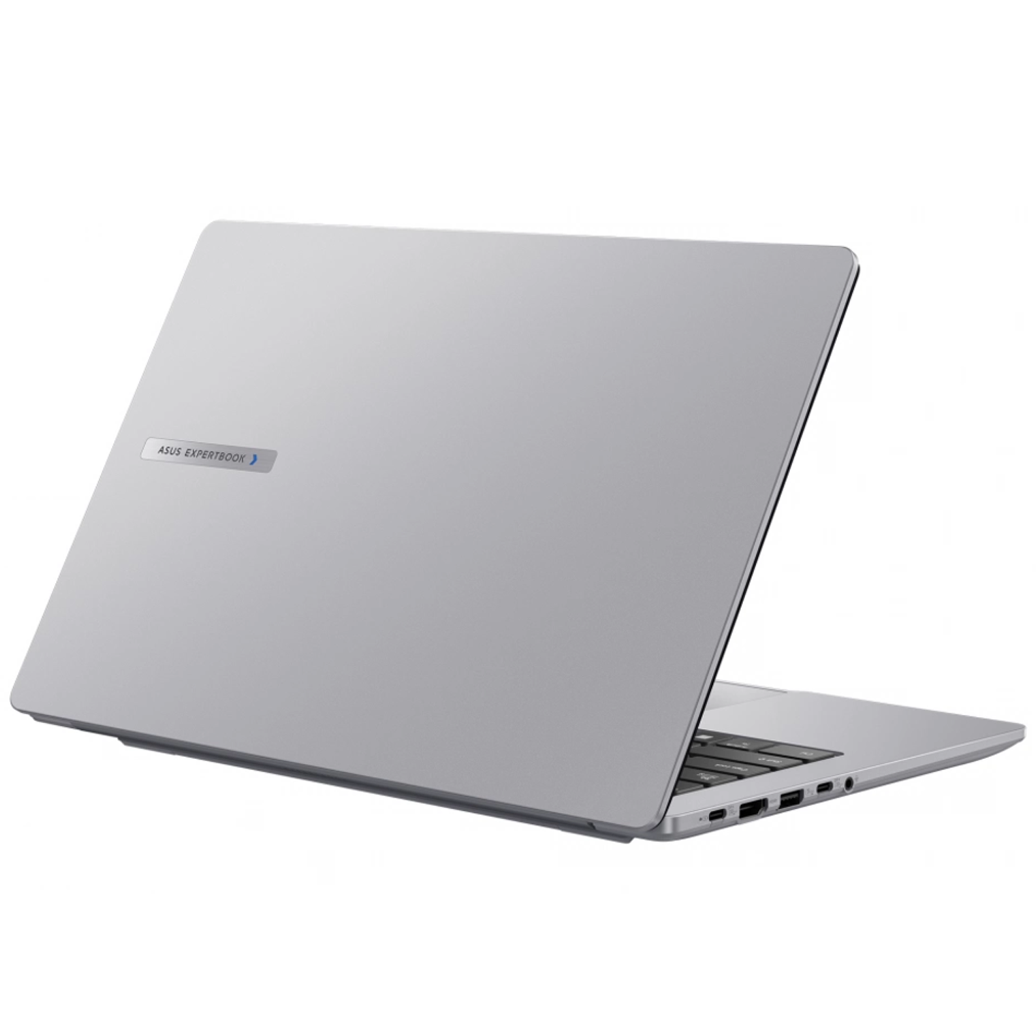 Gümüş renkli bir ASUS ExpertBook dizüstü bilgisayar, logosu görünen beyaz bir yüzeyde duruyor.