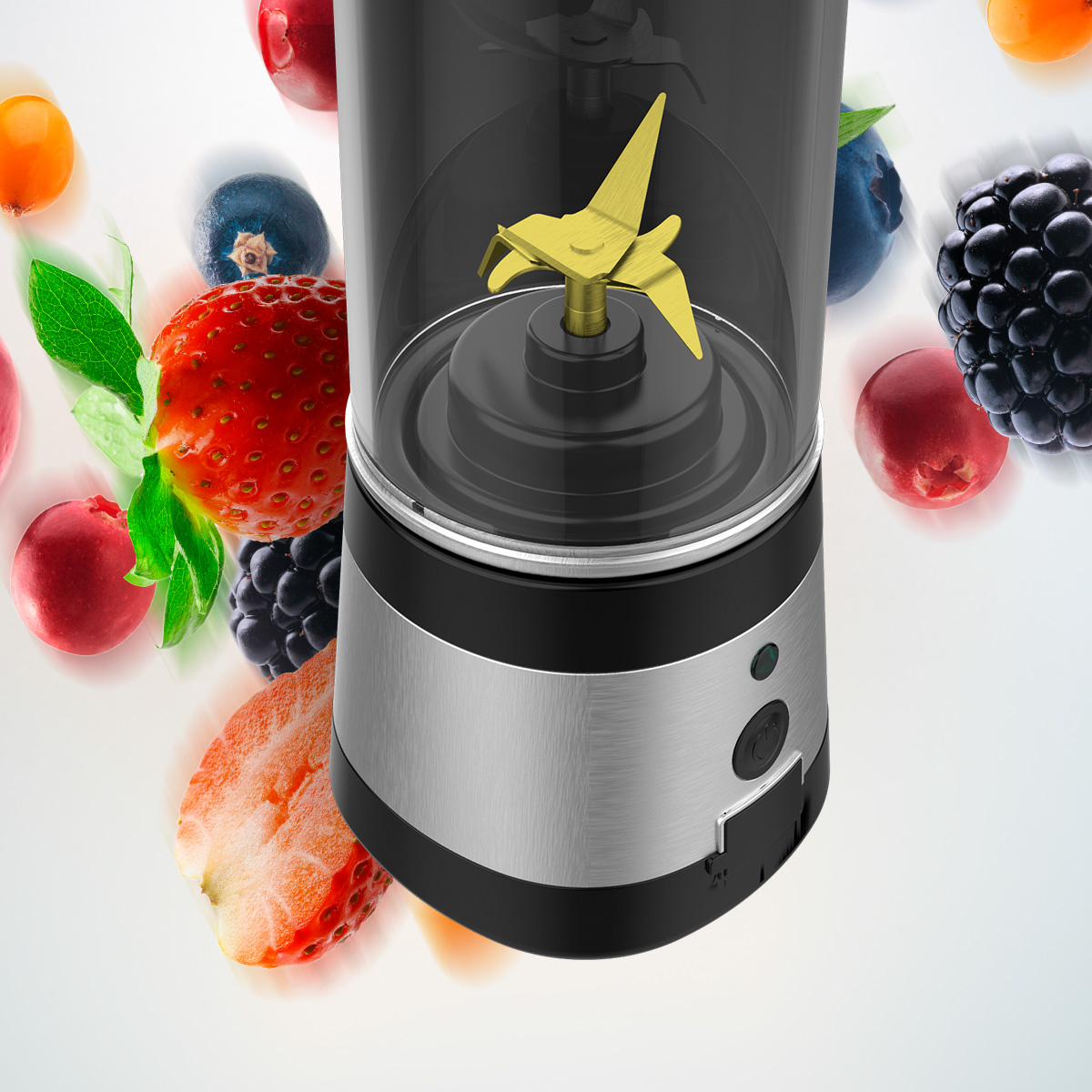 Un frullatore portatile con lame dorate, circondato da bacche e frutta fresca.