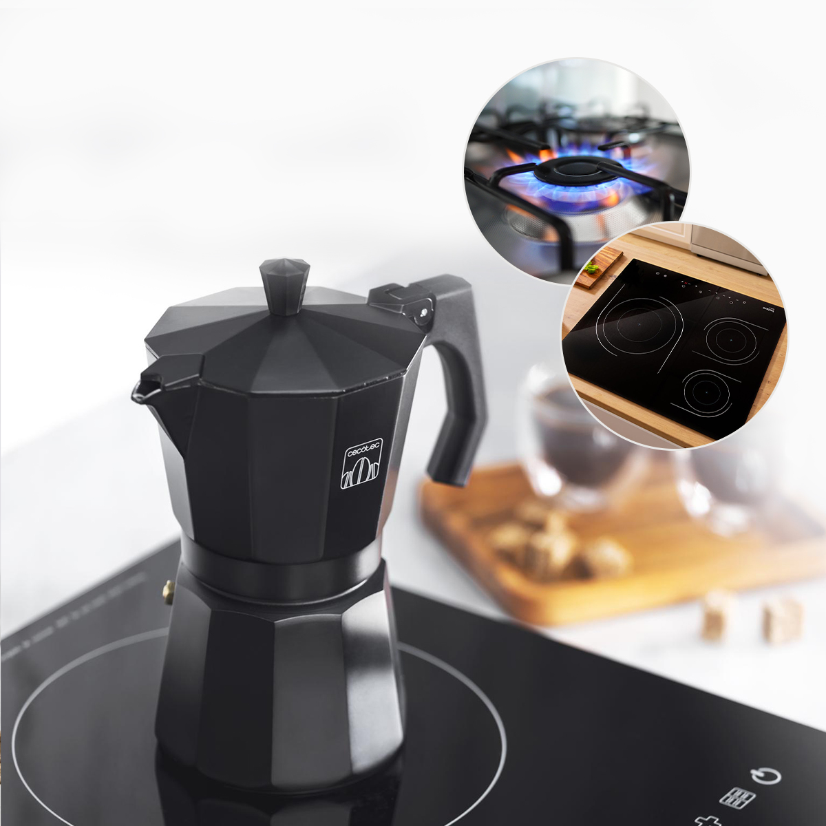 Una moka nera su piano cottura, con inserti circolari che mostrano un bruciatore a gas e induzione.