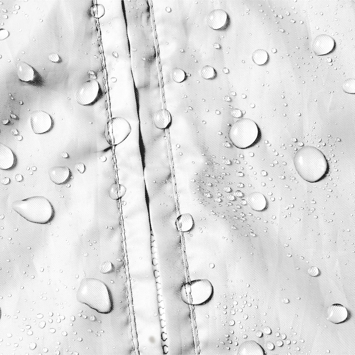 Gocce d'acqua su una superficie tessile idrorepellente con una cucitura.