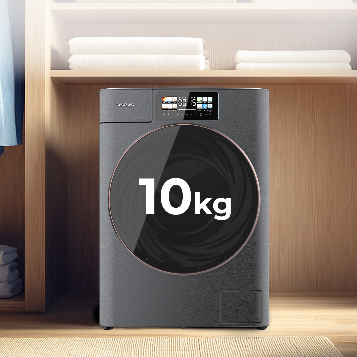 Una lavadora moderna gris oscuro con pantalla digital y el texto '10kg' en la puerta de cristal, en un cuarto de lavado.