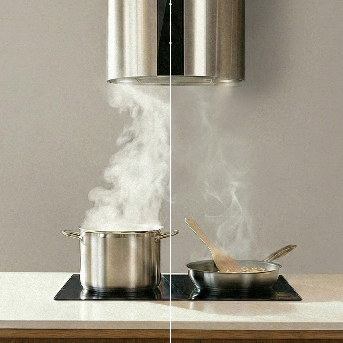Una campana extractora capta el vapor que sale de una olla y una sartén.