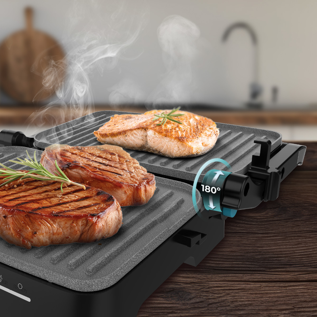 Bistecche e pesce alla griglia su una bistecchiera elettrica in cucina.