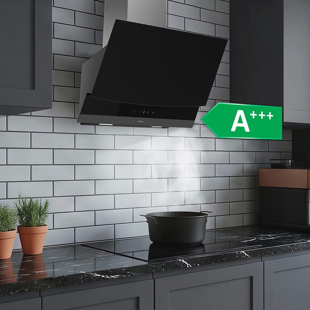 Moderna campana extractora negra sobre una placa con una olla y etiqueta A+++.