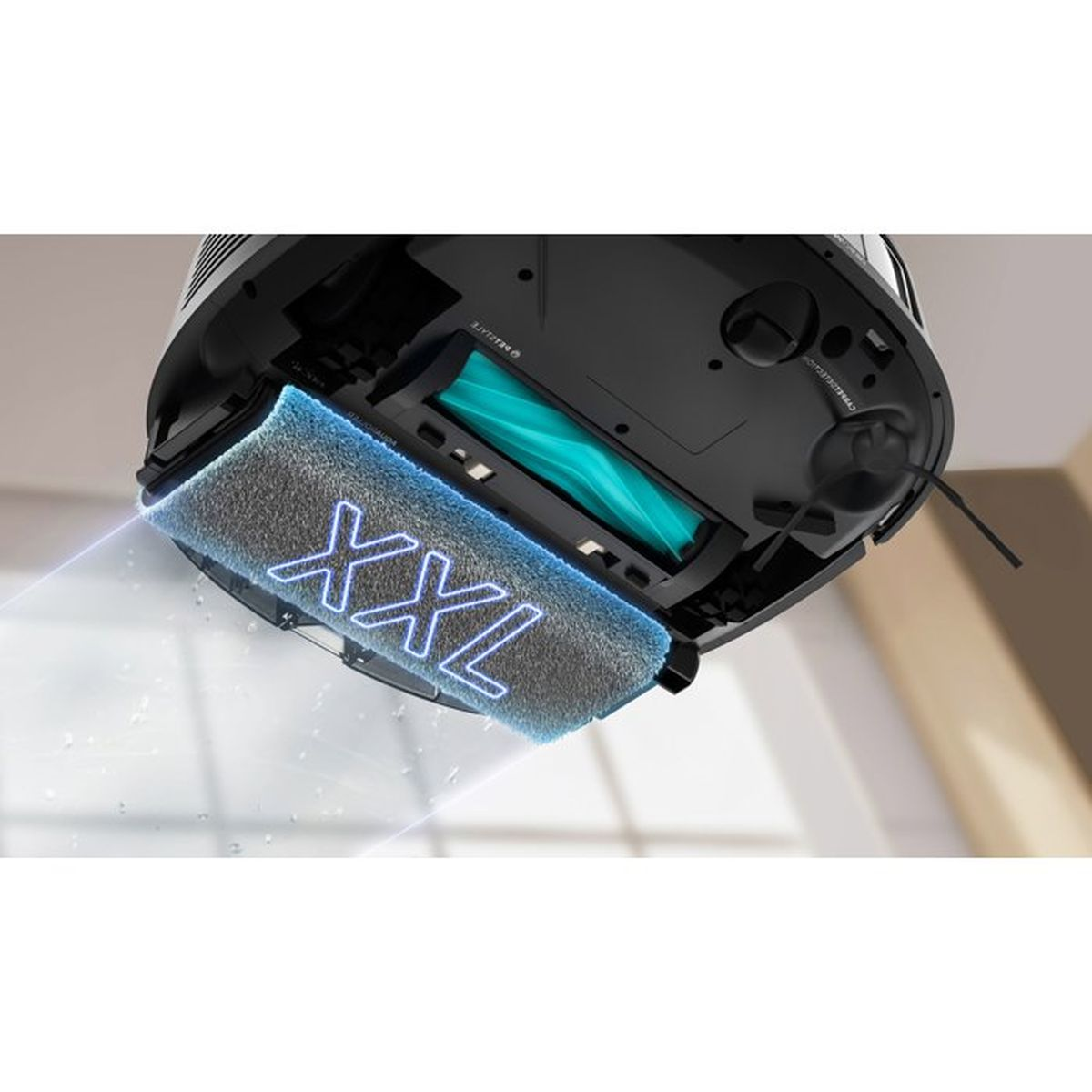 Vista inferior de un robot aspirador negro con una mopa XXL azul brillante y un cepillo de rodillo.