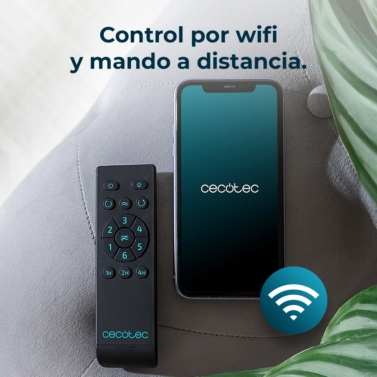 Uno smartphone e un telecomando nero su una superficie grigia con testo in spagnolo.