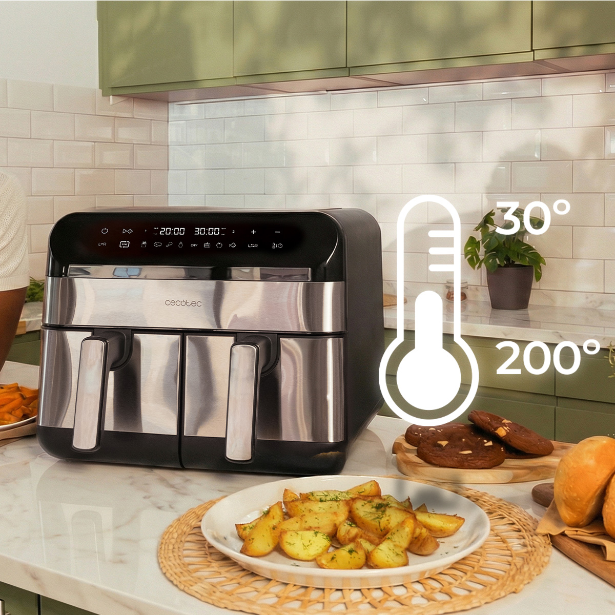 Una freidora de aire sobre una encimera de cocina con comida y un gráfico de temperatura.