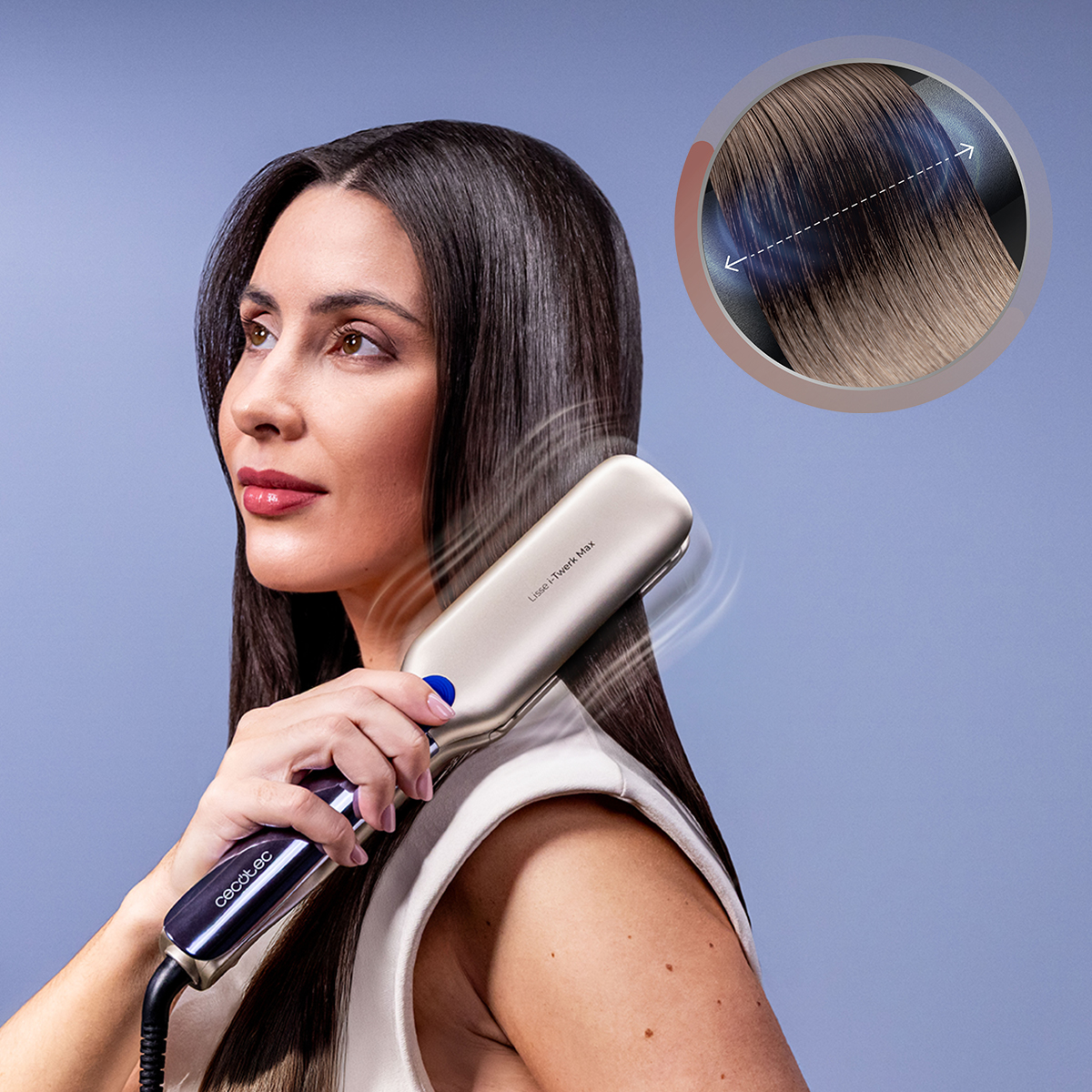 Donna liscia i suoi lunghi capelli scuri con una styler dorata, con un dettaglio in alto a destra.