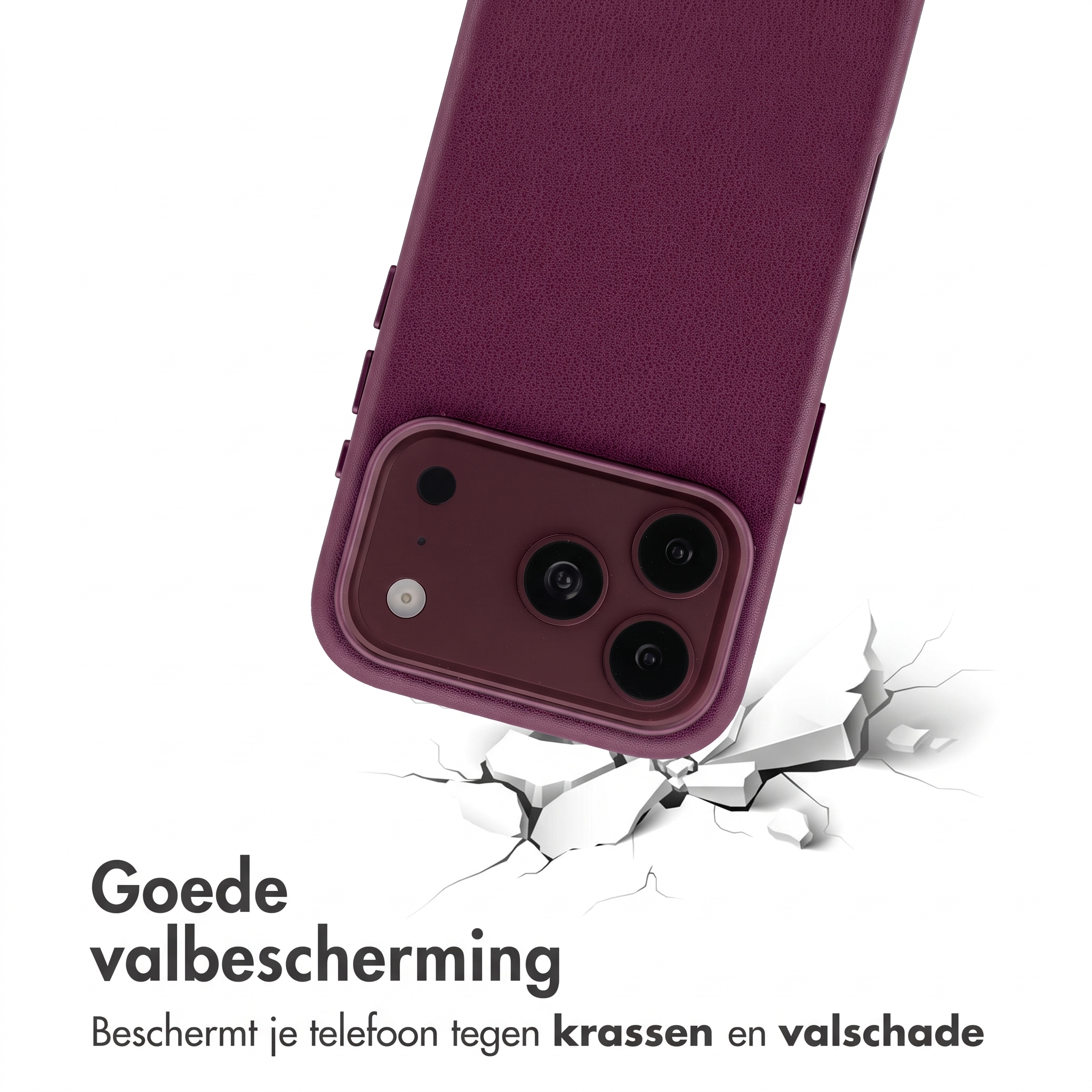 Une coque de smartphone violette protège un appareil heurtant une surface blanche fissurée.