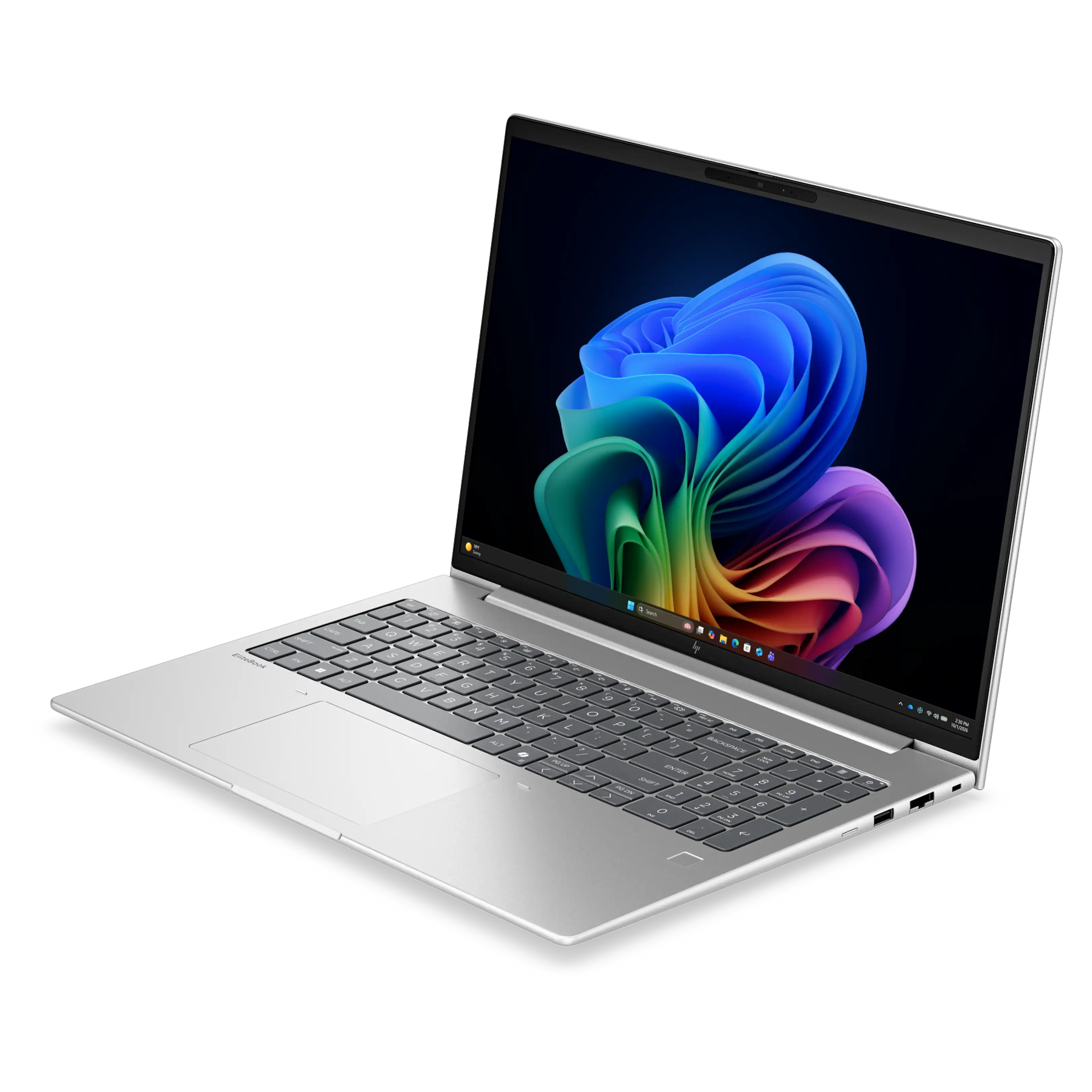 Un computer portatile argentato su sfondo nero mostra uno sfondo colorato e astratto.