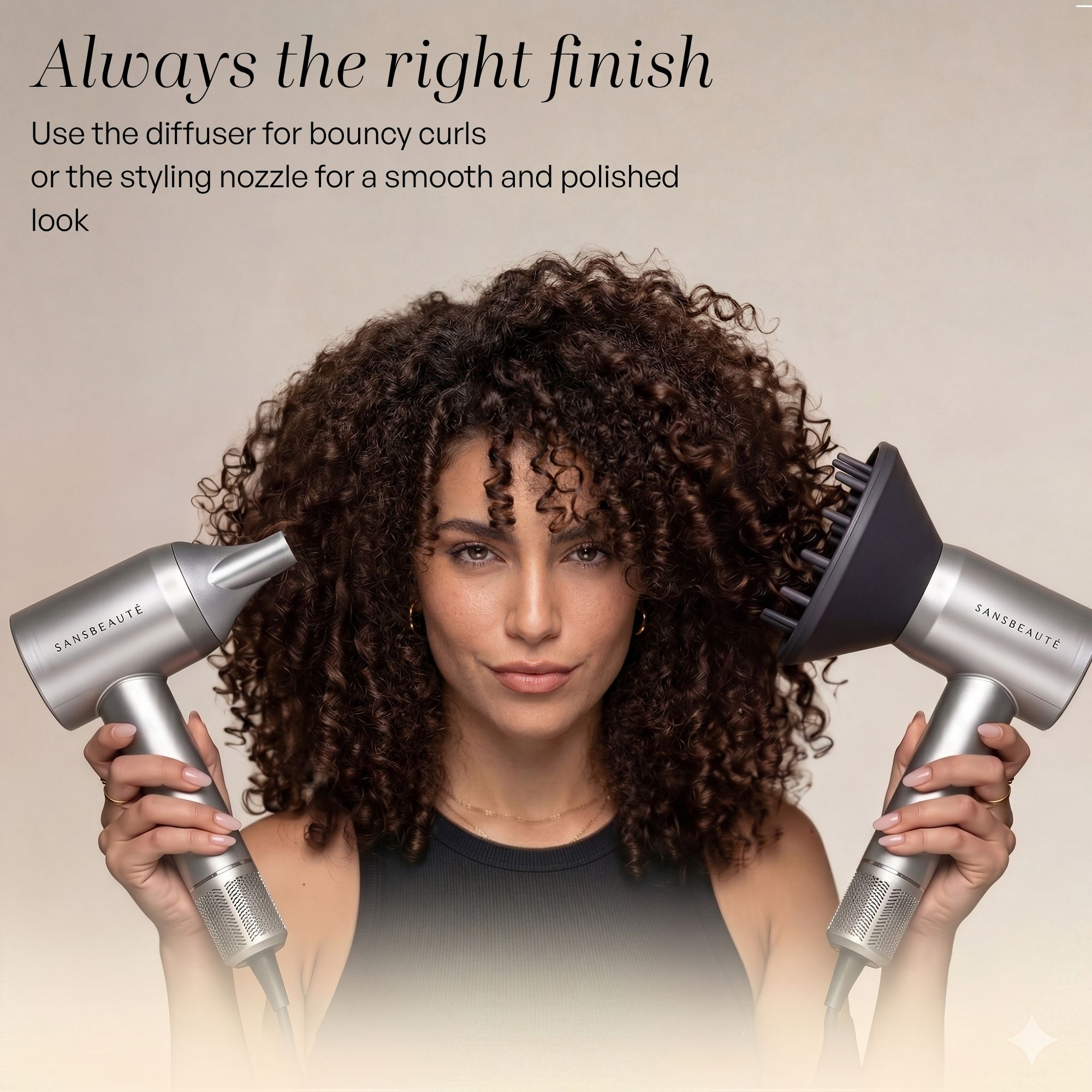 A woman holds two hair dryers with attachments against a beige background.