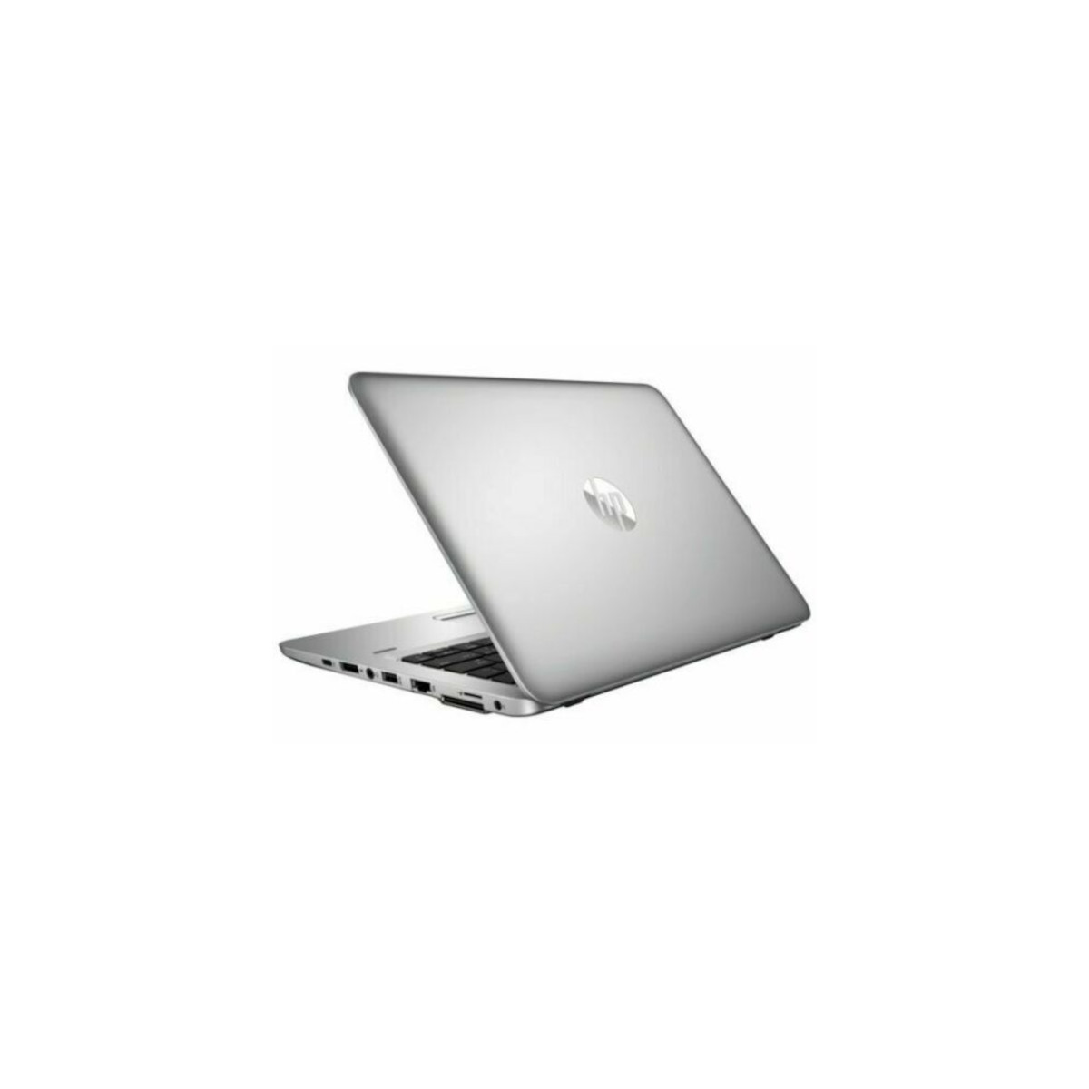 Ein silberner Laptop ist auf einer weißen Oberfläche geschlossen zu sehen.