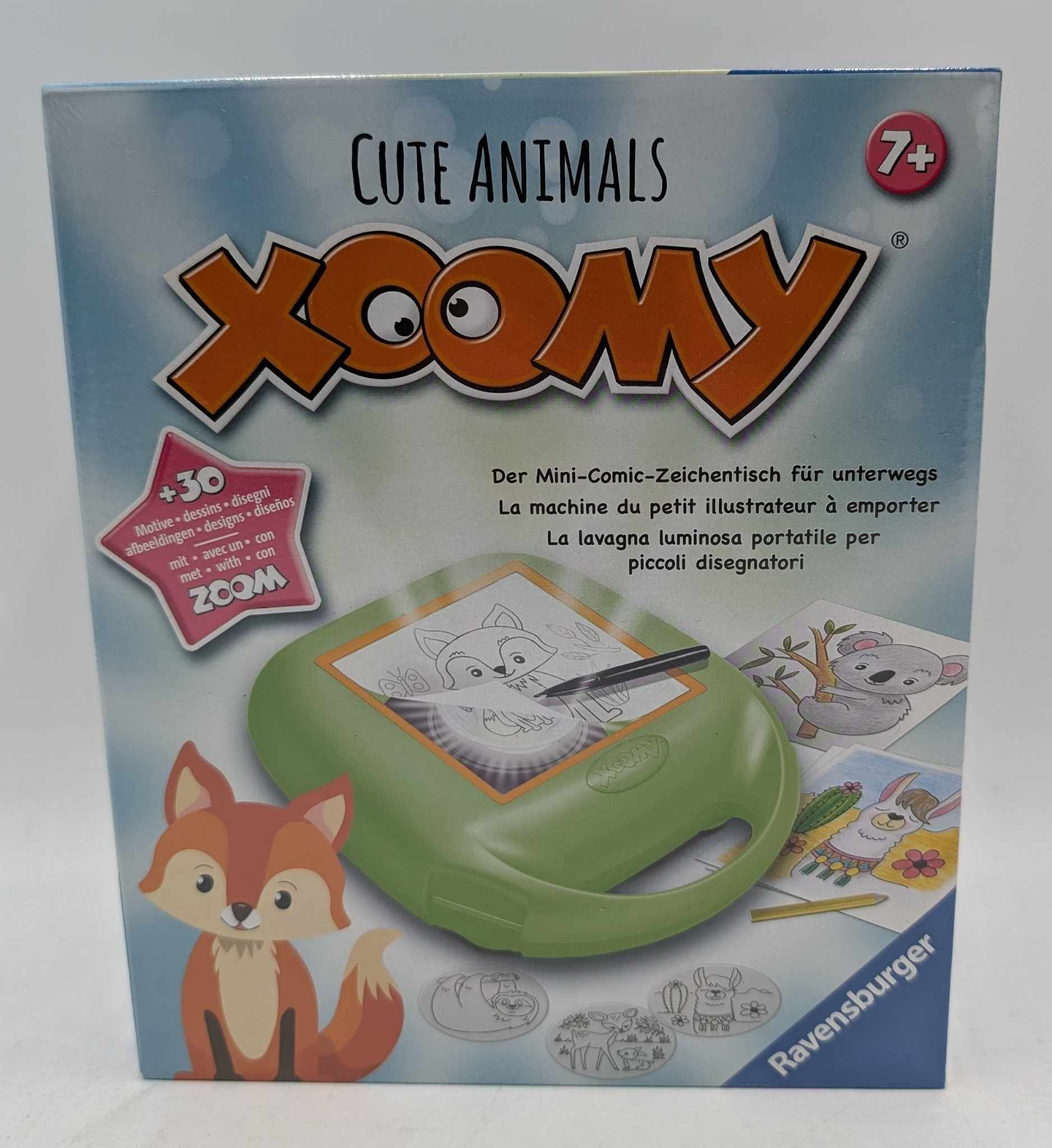 Verpackung des Xoomy Mini-Zeichentisches für Kinder mit niedlichen Tierillustrationen.