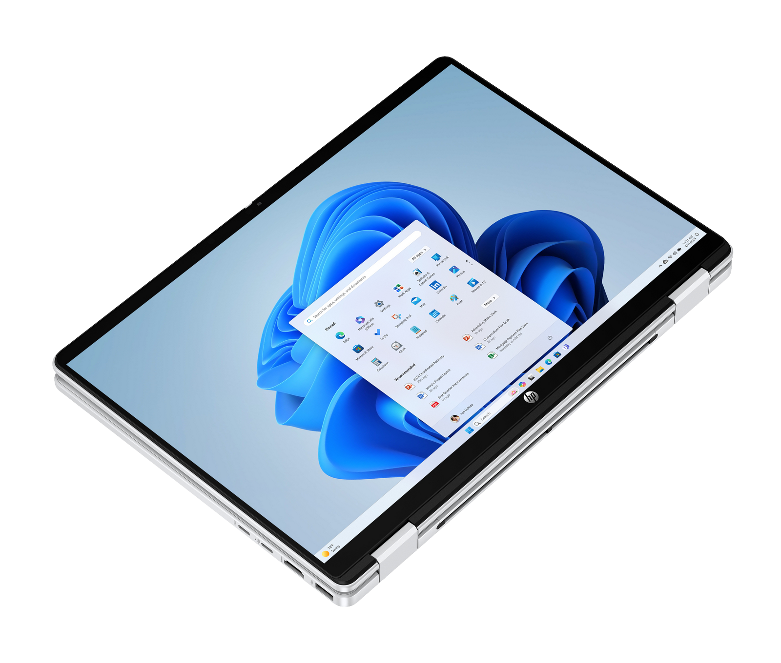 Un laptop HP con desktop Windows 11 con sfondo blu astratto e menu Start aperto su sfondo nero.