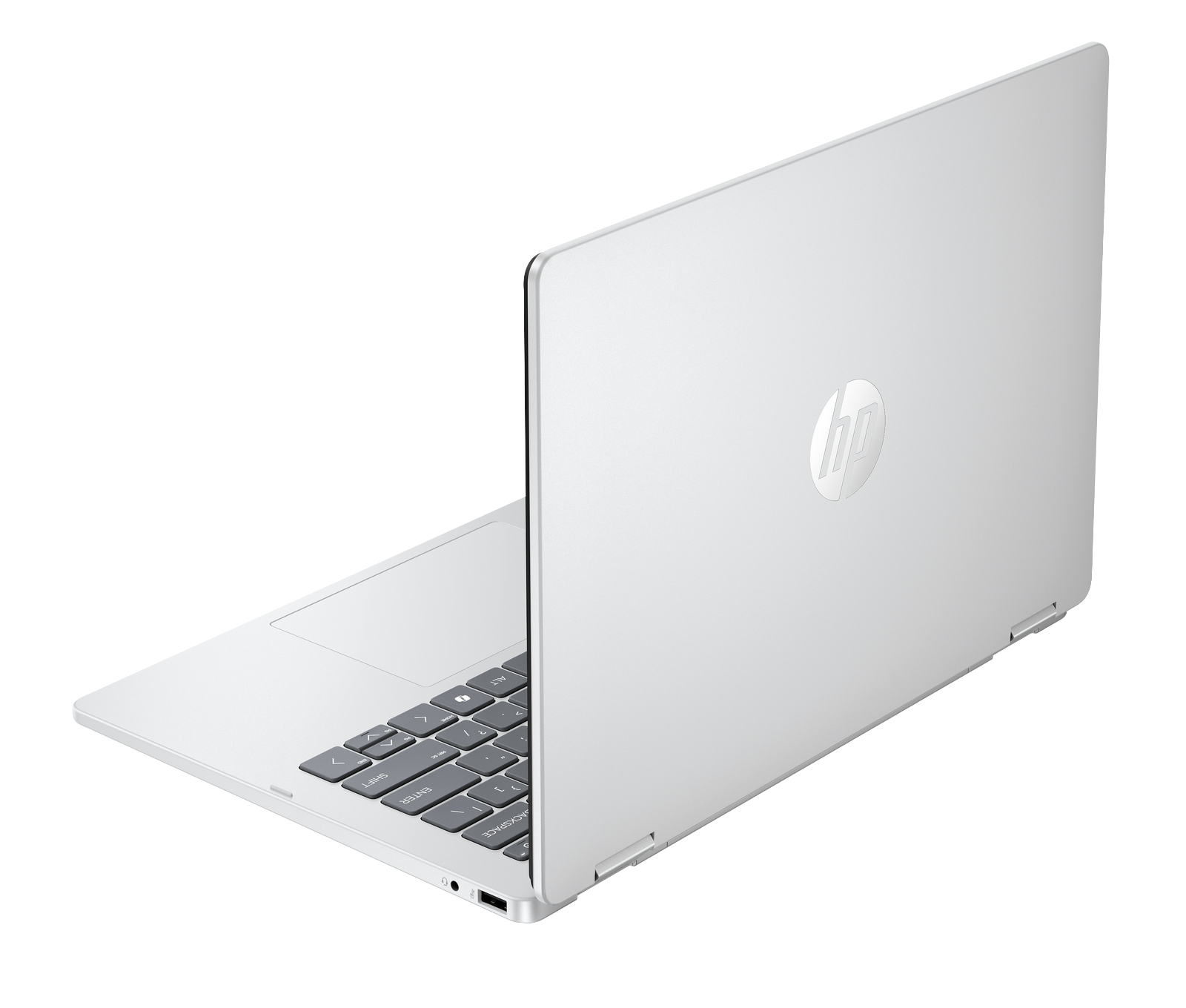 Un laptop HP argentato su sfondo nero, mezzo aperto.