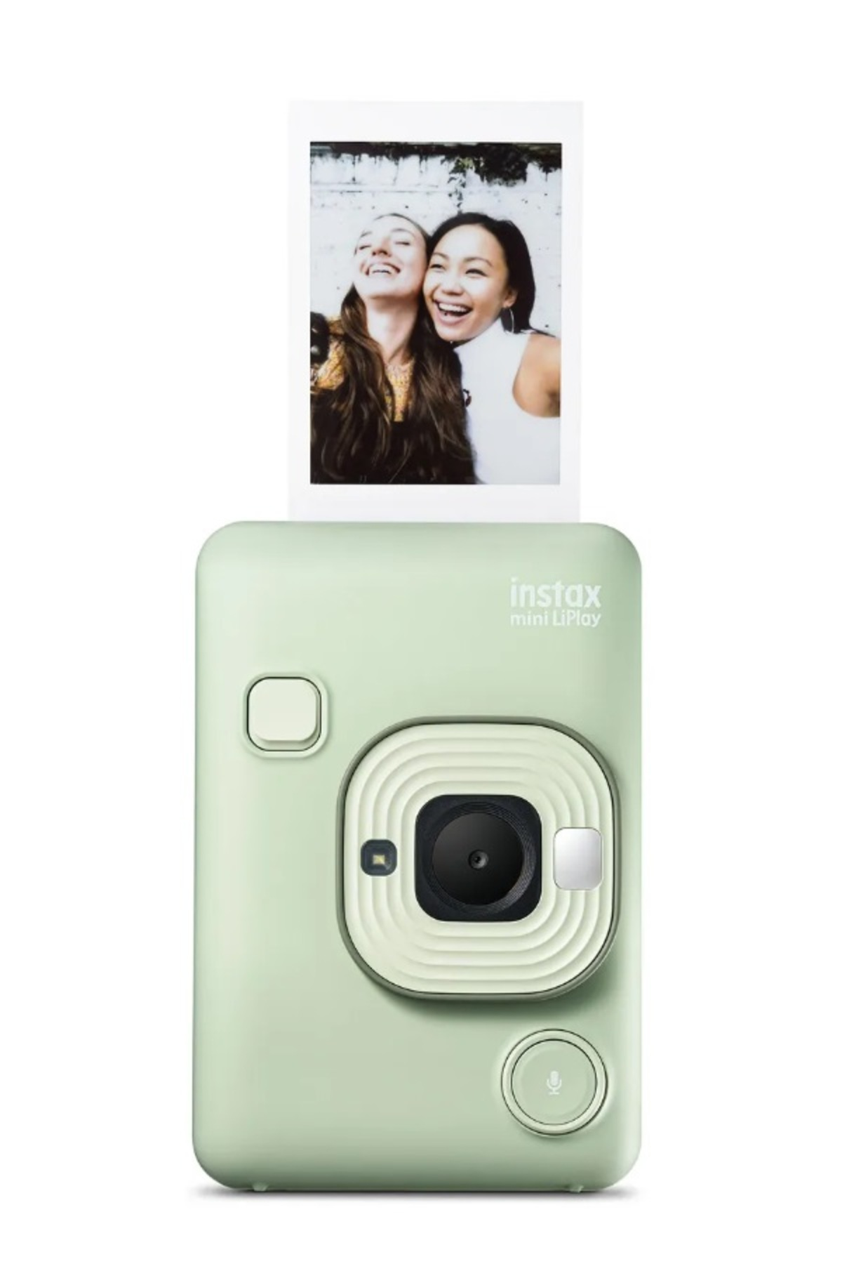 Açık yeşil renkli bir Instax mini LiPlay kamera, gülen iki kadının fotoğrafını çıkarıyor.