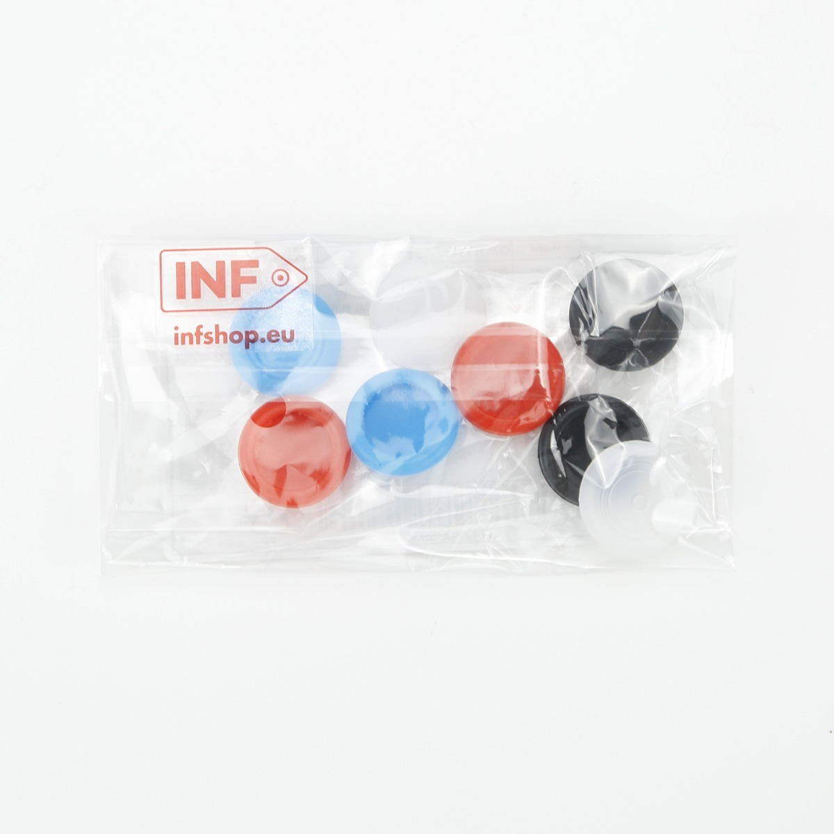 Un sacchetto di plastica con levette per controller colorate in blu, rosso, nero e bianco.