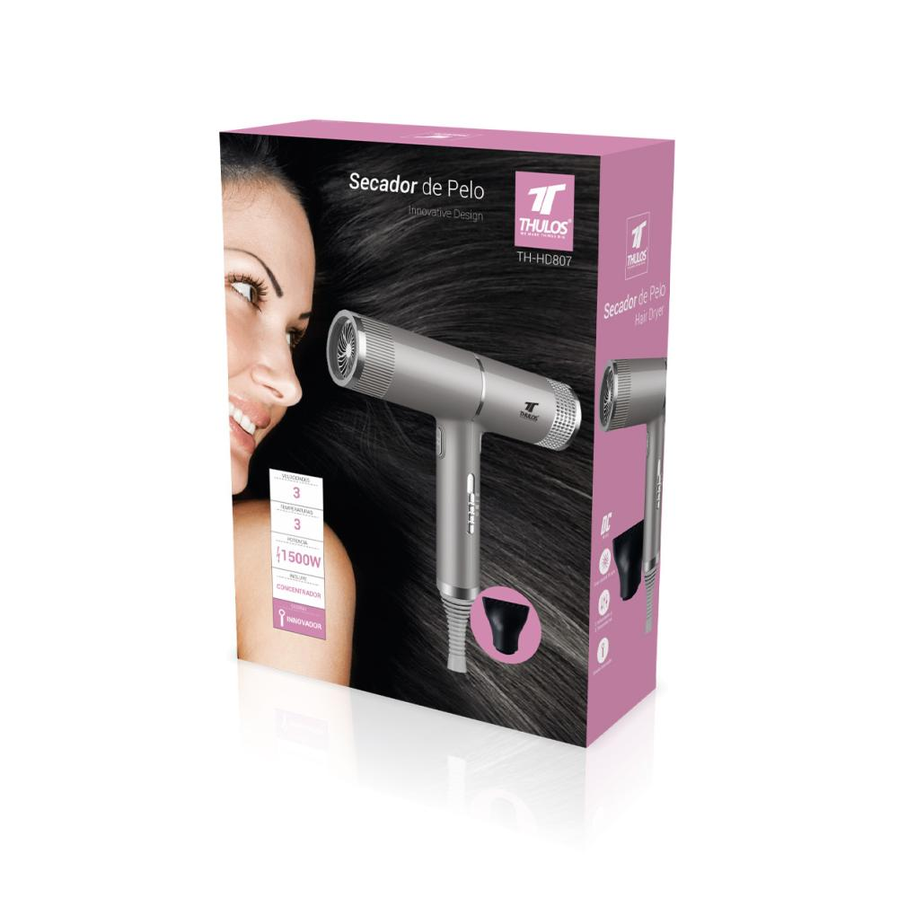 Confezione rosa e nera per asciugacapelli Thulos, con un moderno asciugacapelli argento e una donna.