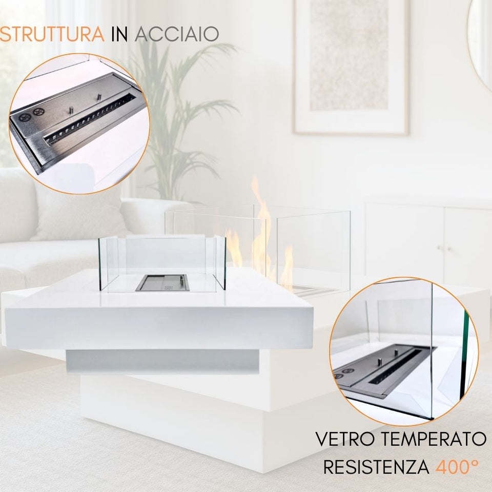 Moderno caminetto a bioetanolo bianco con bruciatore in acciaio e vetro temperato in un soggiorno.