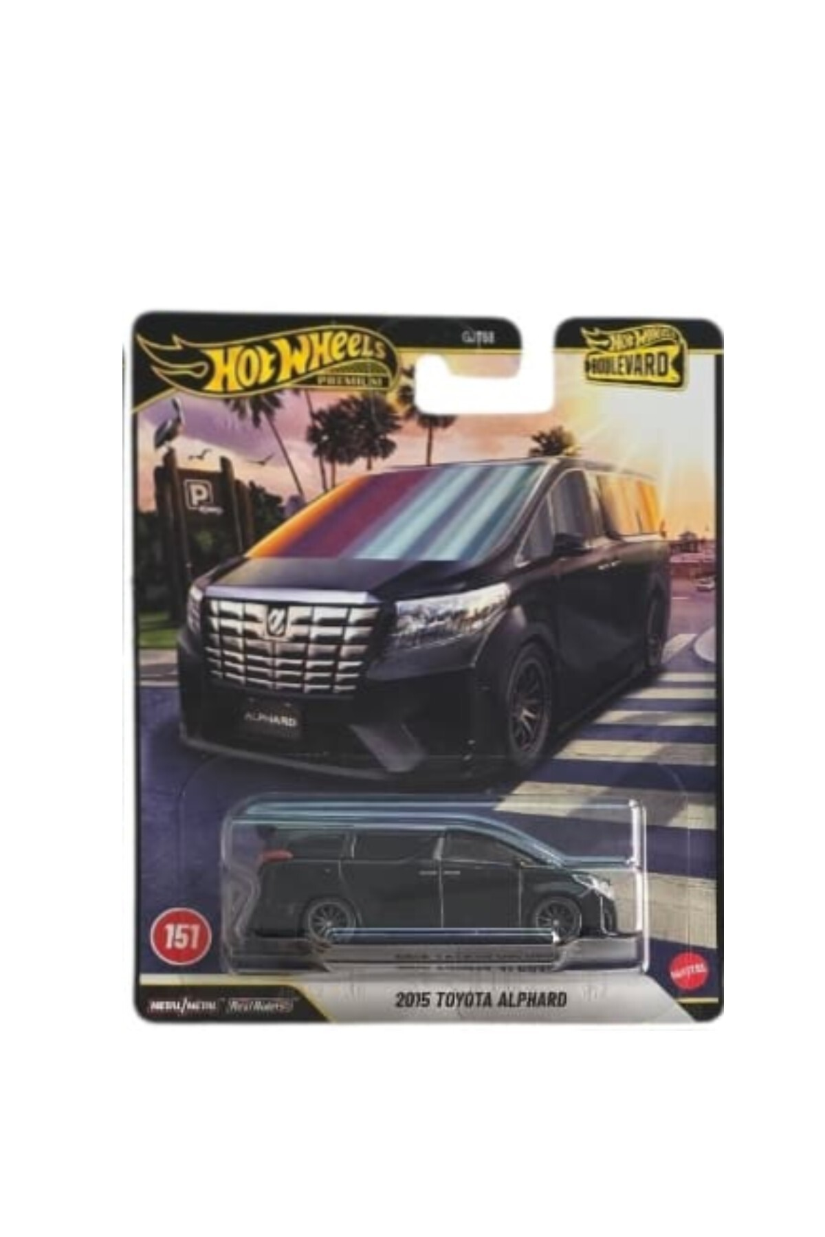 Palmiye arka planlı açılmamış blister ambalajında Hot Wheels Premium Boulevard 2015 Toyota Alphard oyuncak araba.