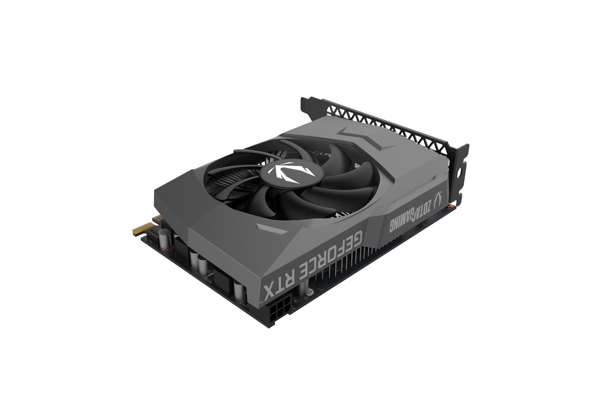 Szara karta graficzna Zotac Gaming z pojedynczym wentylatorem na czarnym laminacie na białym tle.