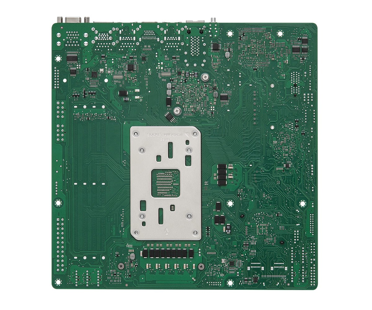 Placa base de computadora verde con un zócalo de CPU plateado en el centro y numerosos componentes electrónicos.