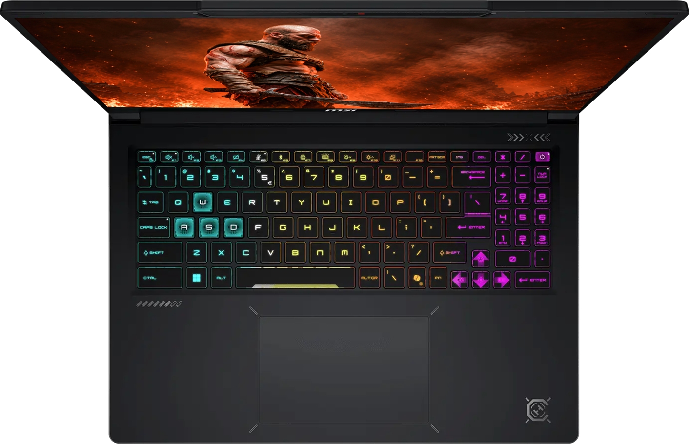 Renkli RGB klavye arka aydınlatmasına ve ekranda fantezi oyun duvar kağıdına sahip siyah bir oyun dizüstü bilgisayarı.