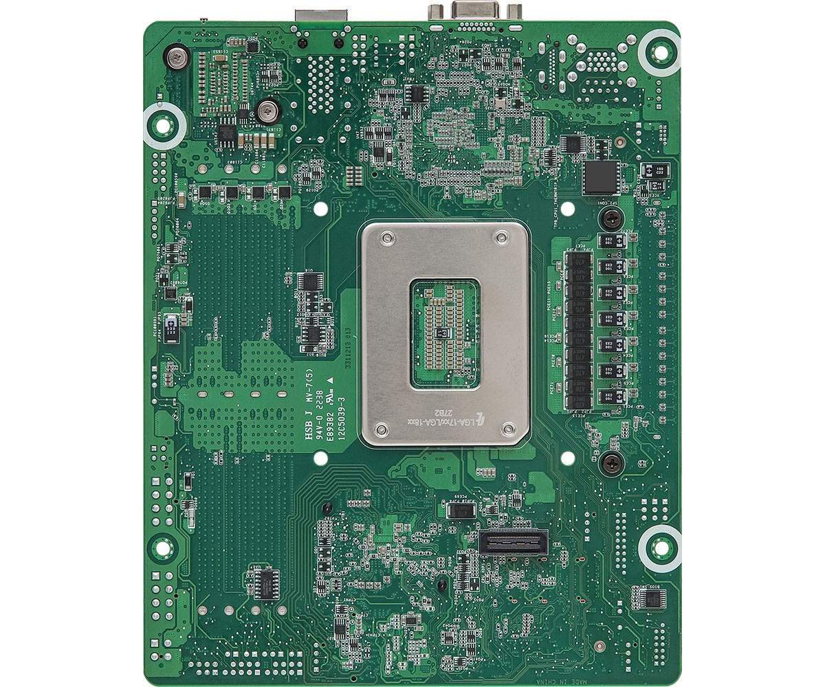 Placa madre verde con un zócalo de CPU central y varios componentes electrónicos.