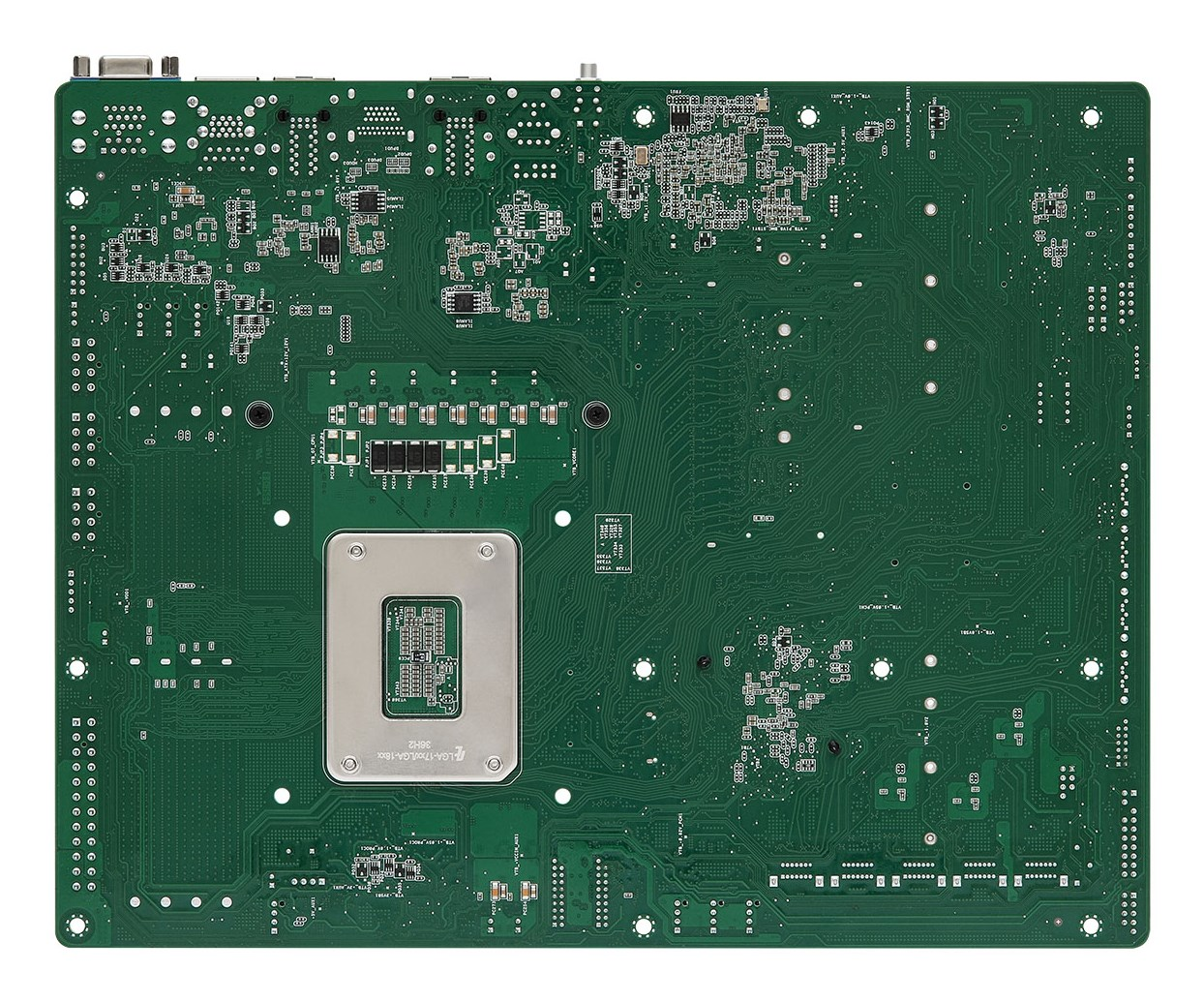Placa base de ordenador verde con componentes electrónicos y un zócalo de CPU plateado en la parte trasera.