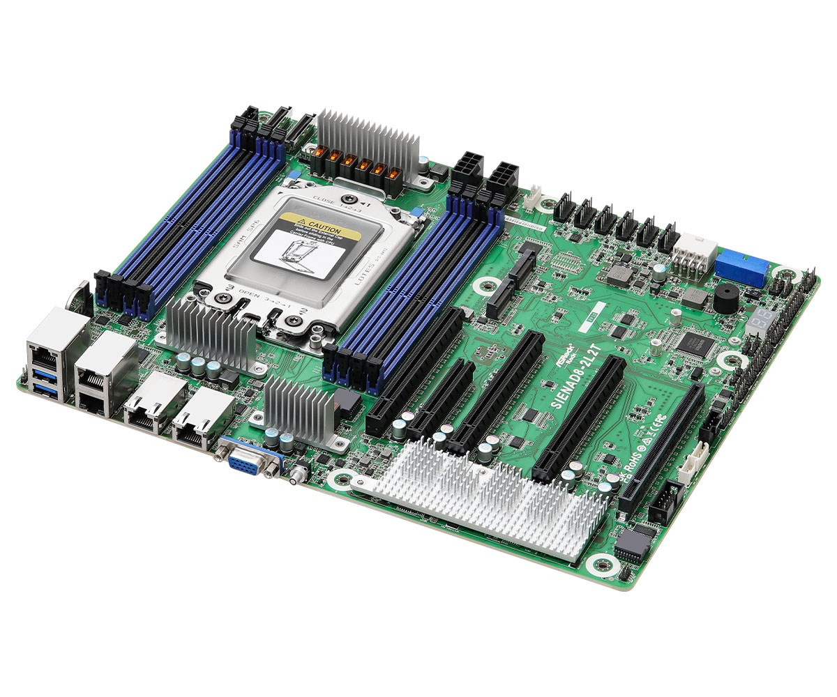 Scheda madre verde con slot RAM blu, socket CPU, dissipatori di calore e varie porte su sfondo bianco.