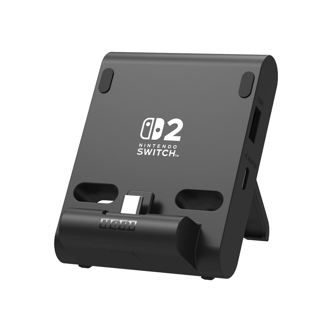 Supporto di ricarica nero per Nintendo Switch 2 con porta USB e supporto su sfondo bianco.